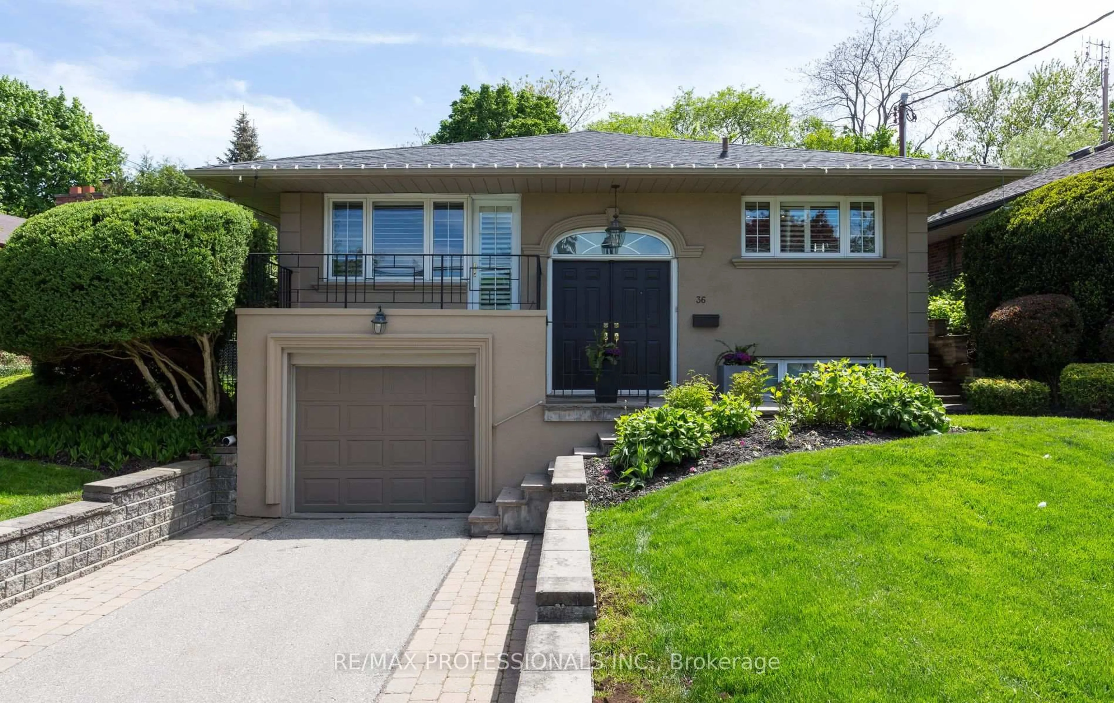 Home with brick exterior material, street for 36 Ravenscrest Dr, Toronto Ontario M9B 5M7