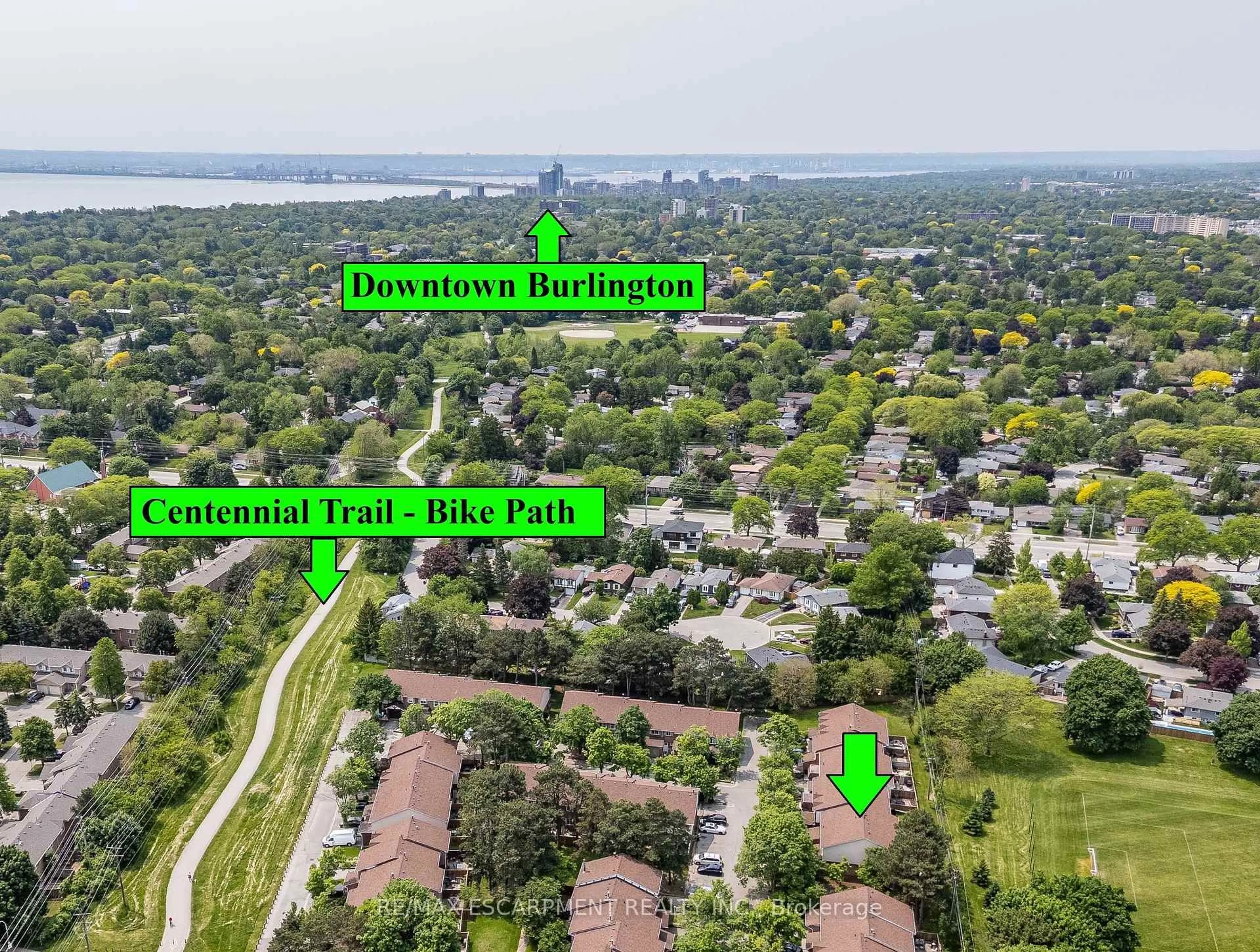 A pic from outside/outdoor area/front of a property/back of a property/a pic from drone, water/lake/river/ocean view for 4197 Longmoor Dr #1, Burlington Ontario L7L 5J9