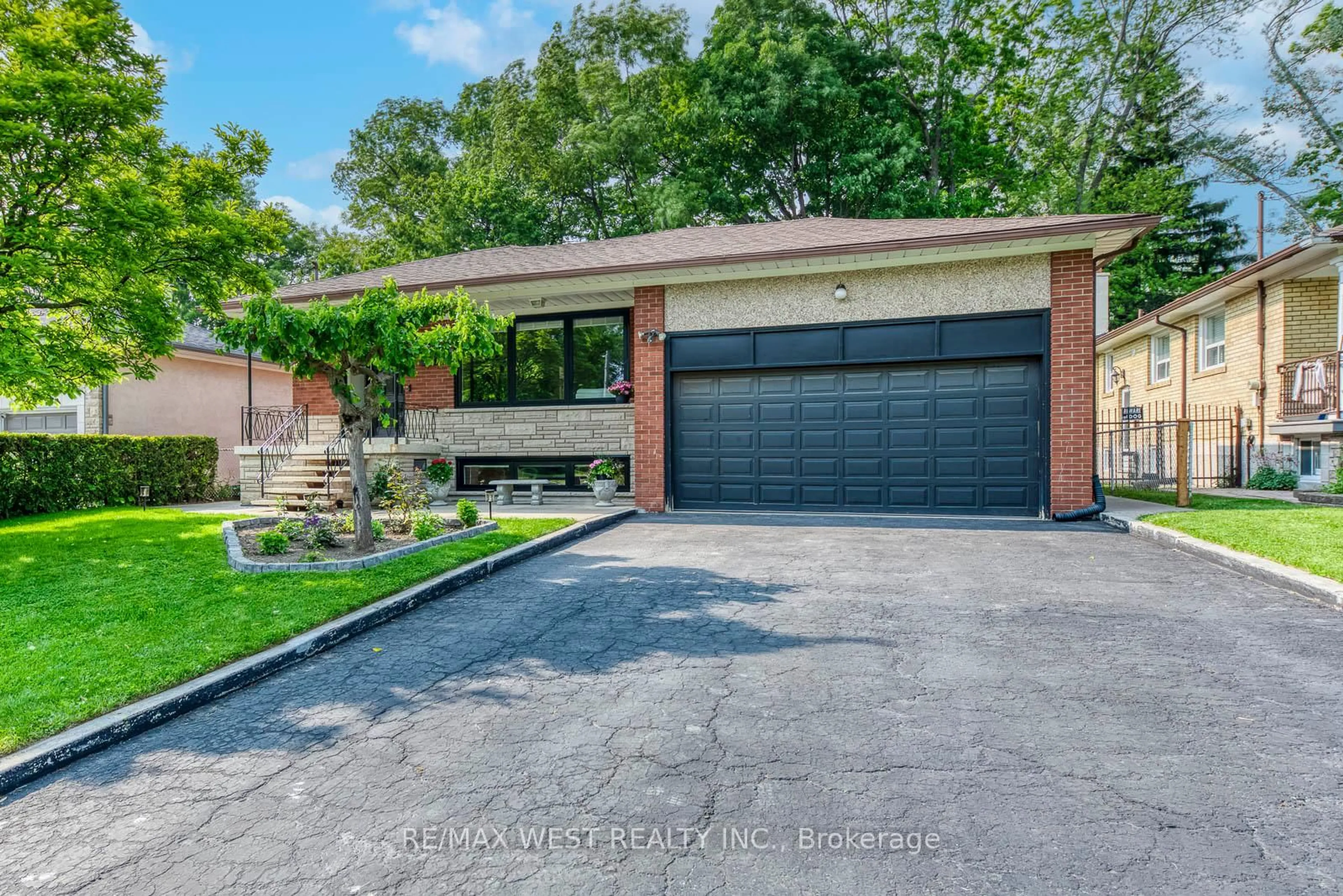 Home with brick exterior material, street for 12 Redbank Rd, Toronto Ontario M6M 2X5