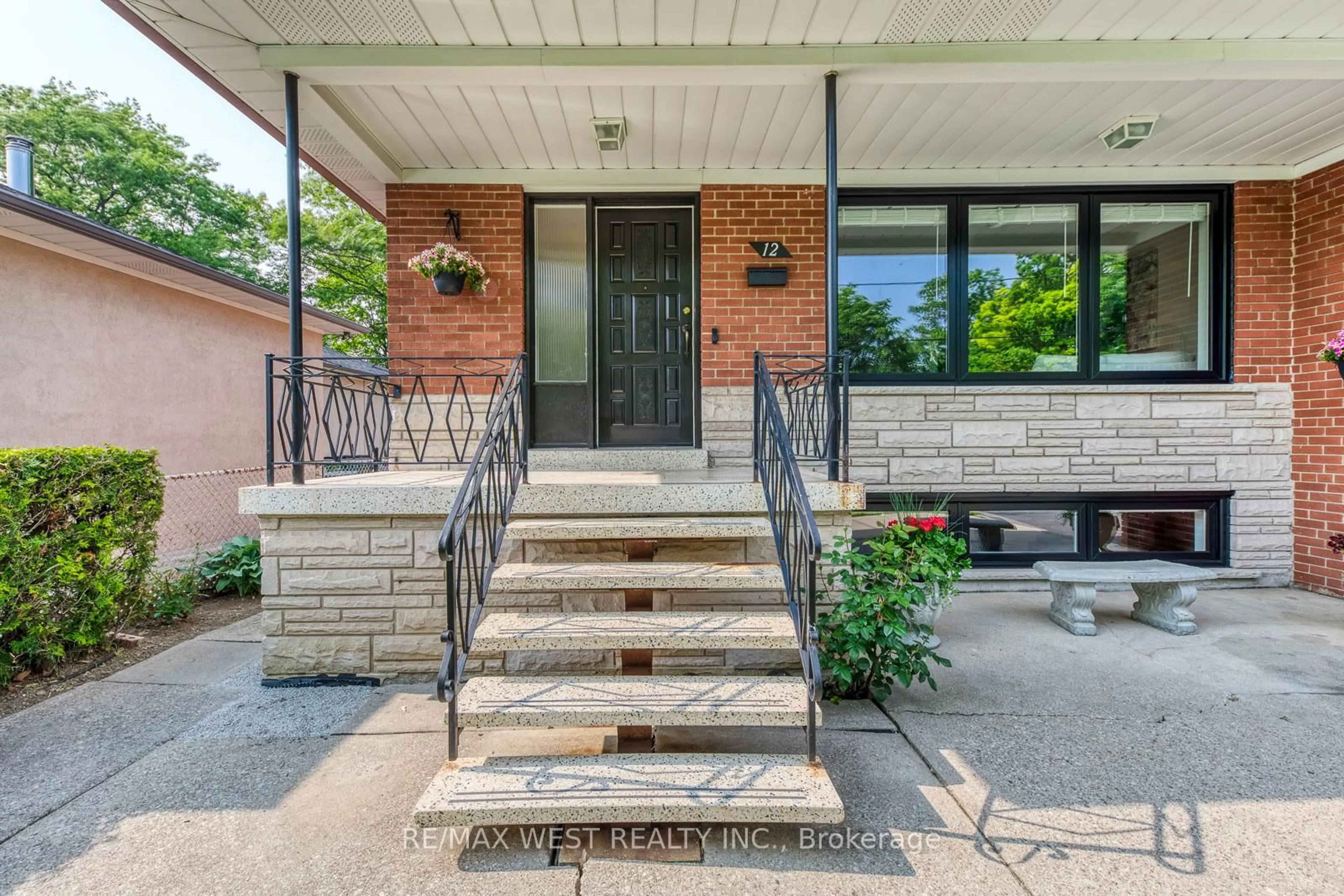 Home with brick exterior material, street for 12 Redbank Rd, Toronto Ontario M6M 2X5