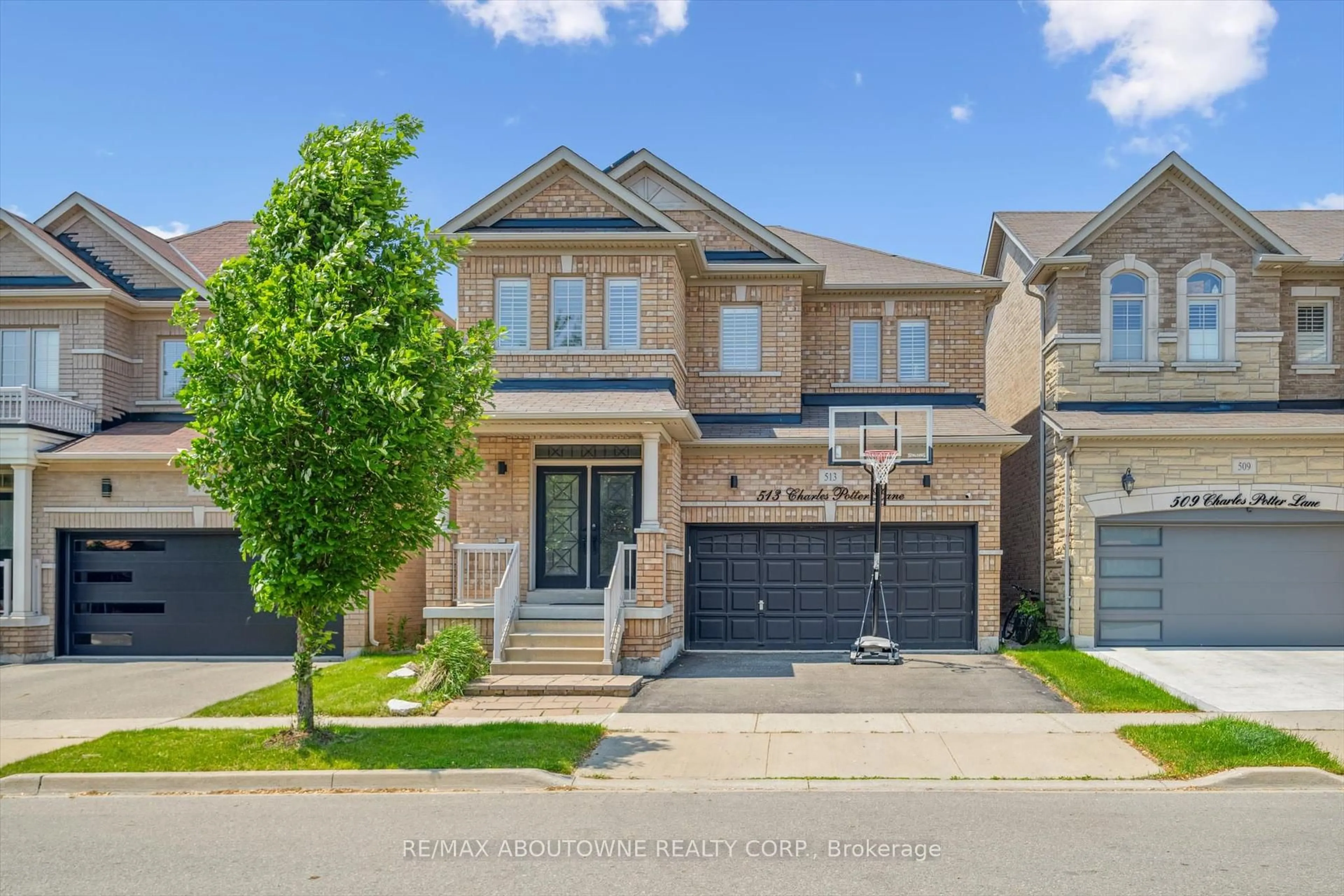 Home with brick exterior material, street for 513 Charles Potter Lane, Oakville Ontario L6M 0P7