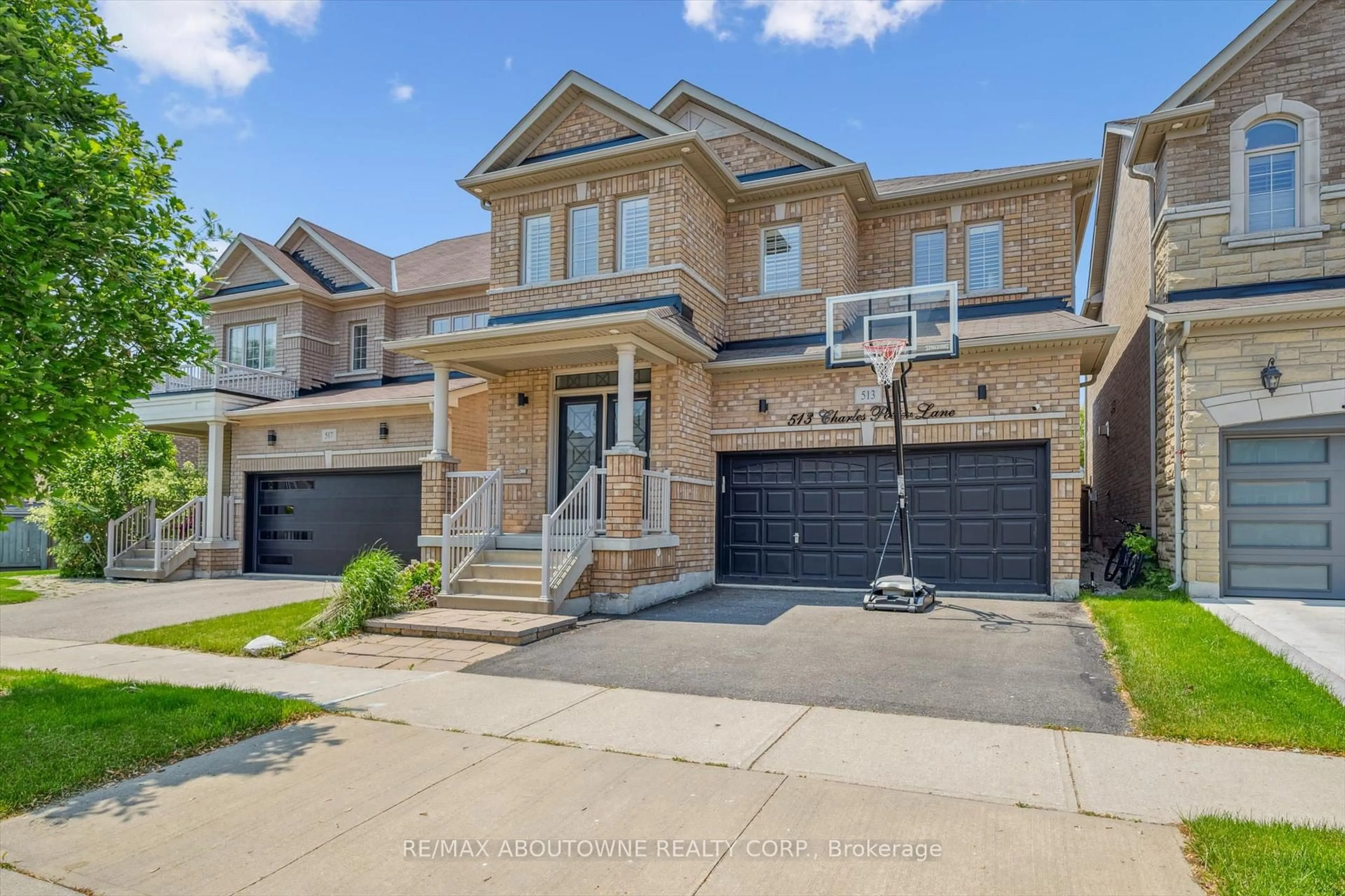 Home with brick exterior material, street for 513 Charles Potter Lane, Oakville Ontario L6M 0P7