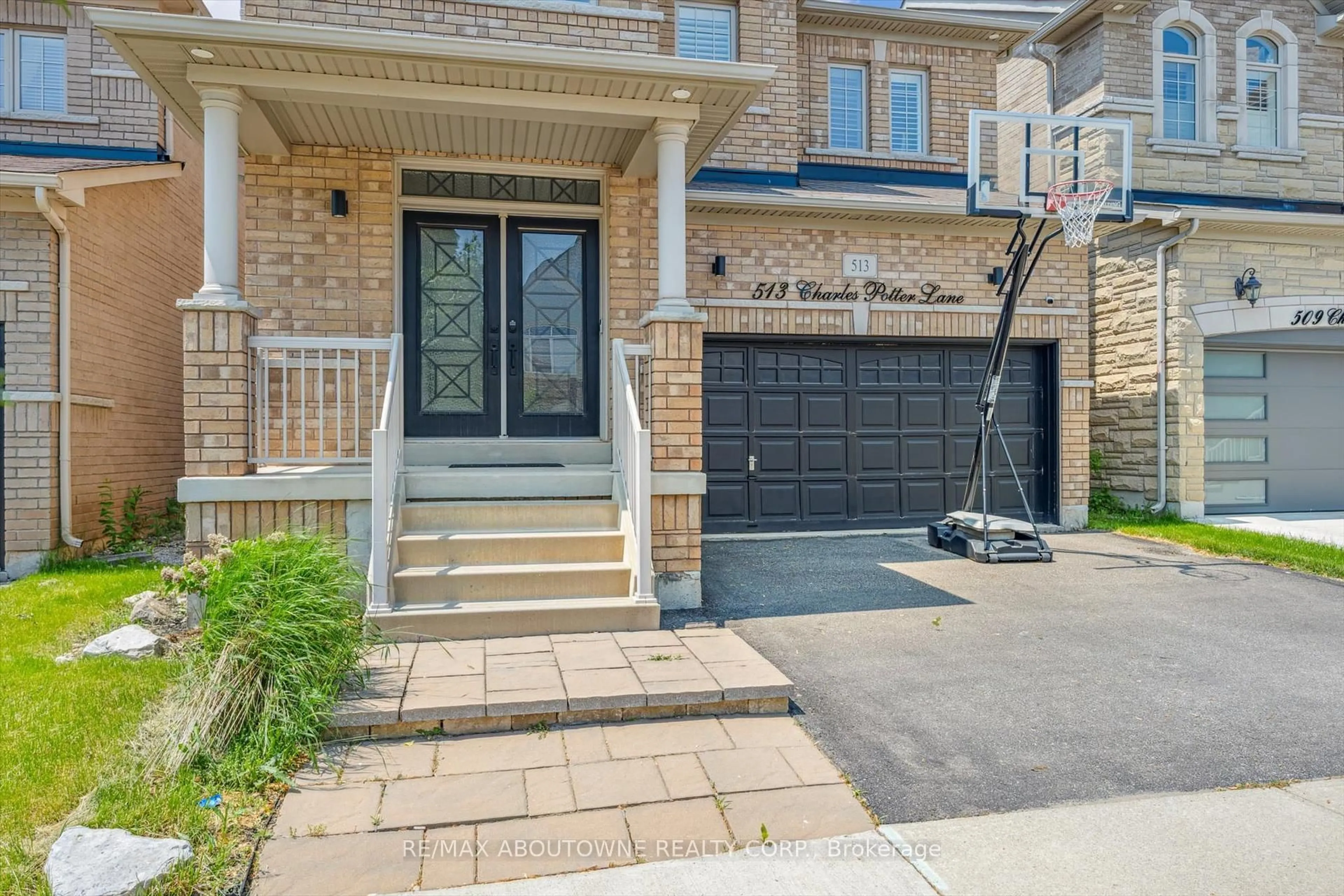 Home with brick exterior material, street for 513 Charles Potter Lane, Oakville Ontario L6M 0P7