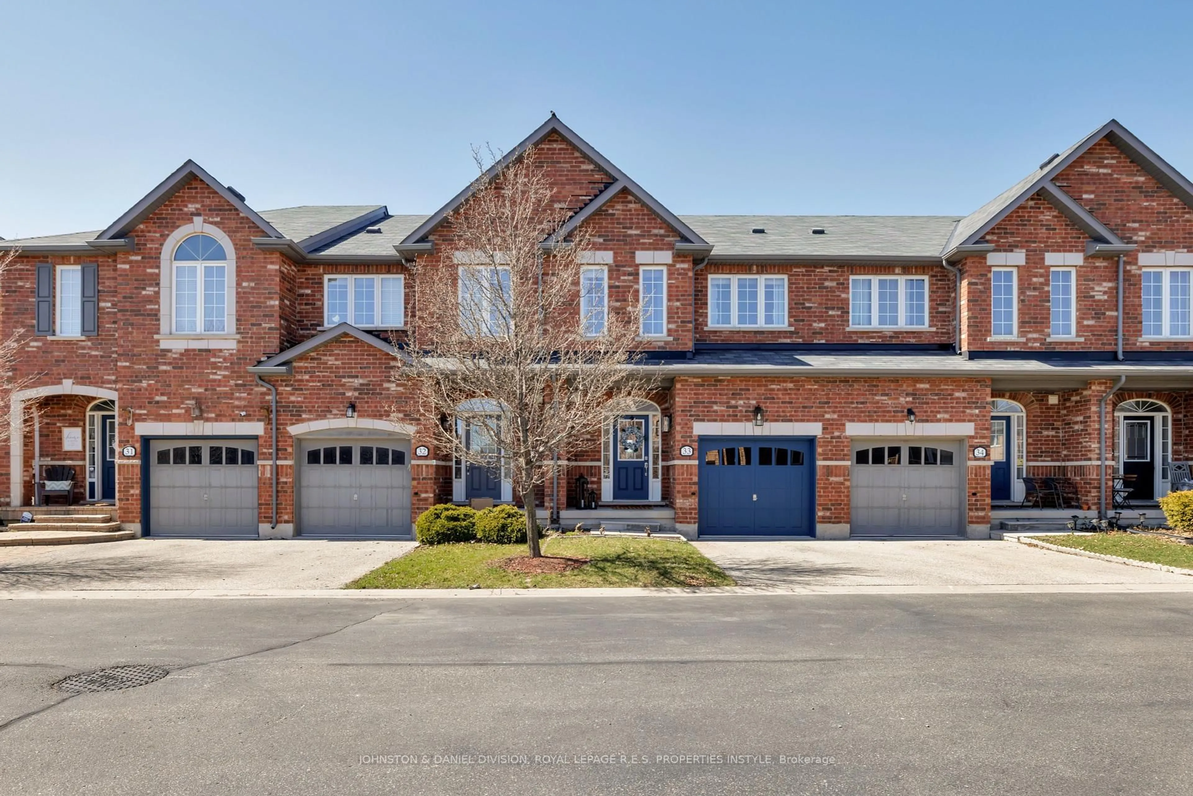 Home with brick exterior material, street for 651 Farmstead Dr #33, Milton Ontario L9T 7W2