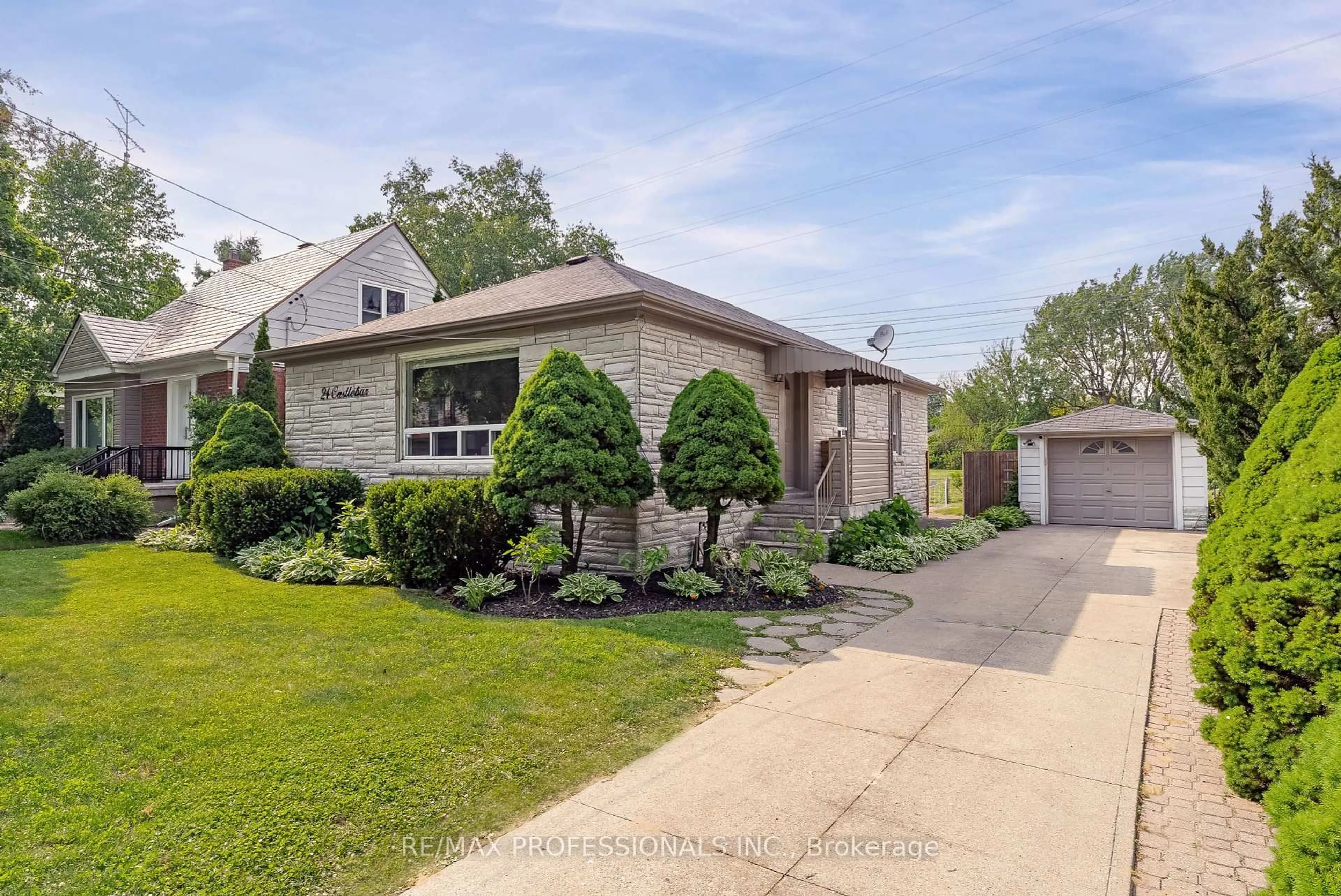 Home with brick exterior material, street for 24 Castlebar Rd, Toronto Ontario M8Z 2J5