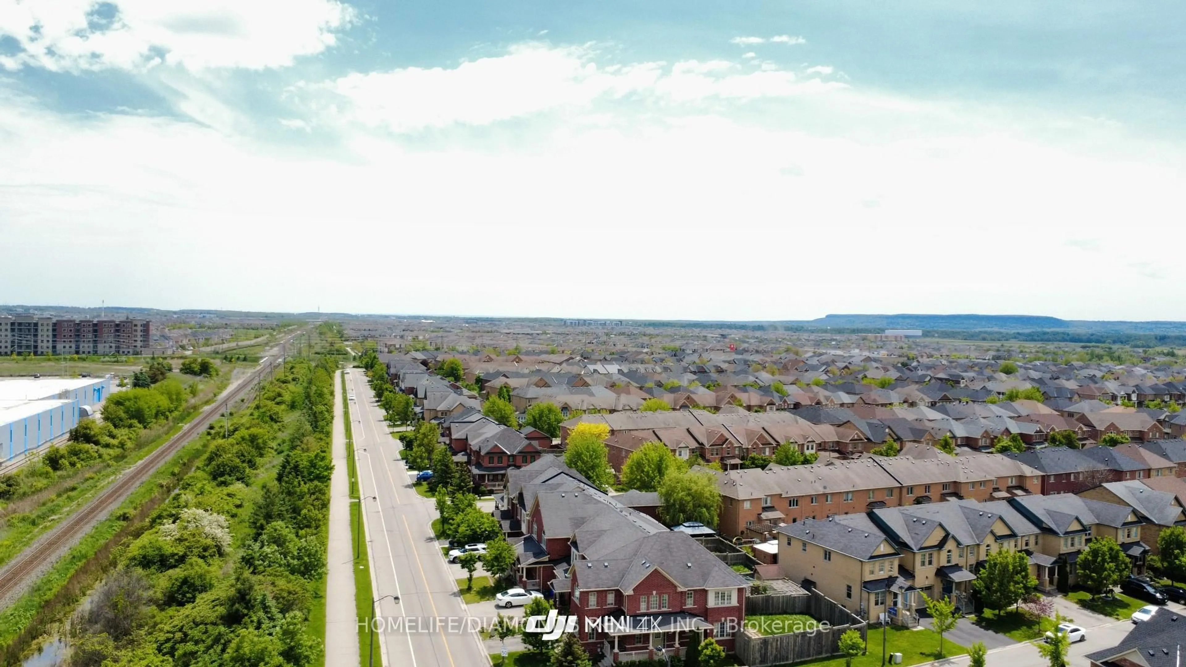 A pic from outside/outdoor area/front of a property/back of a property/a pic from drone, street for 410 DUNCAN Lane, Milton Ontario L9T 0S9