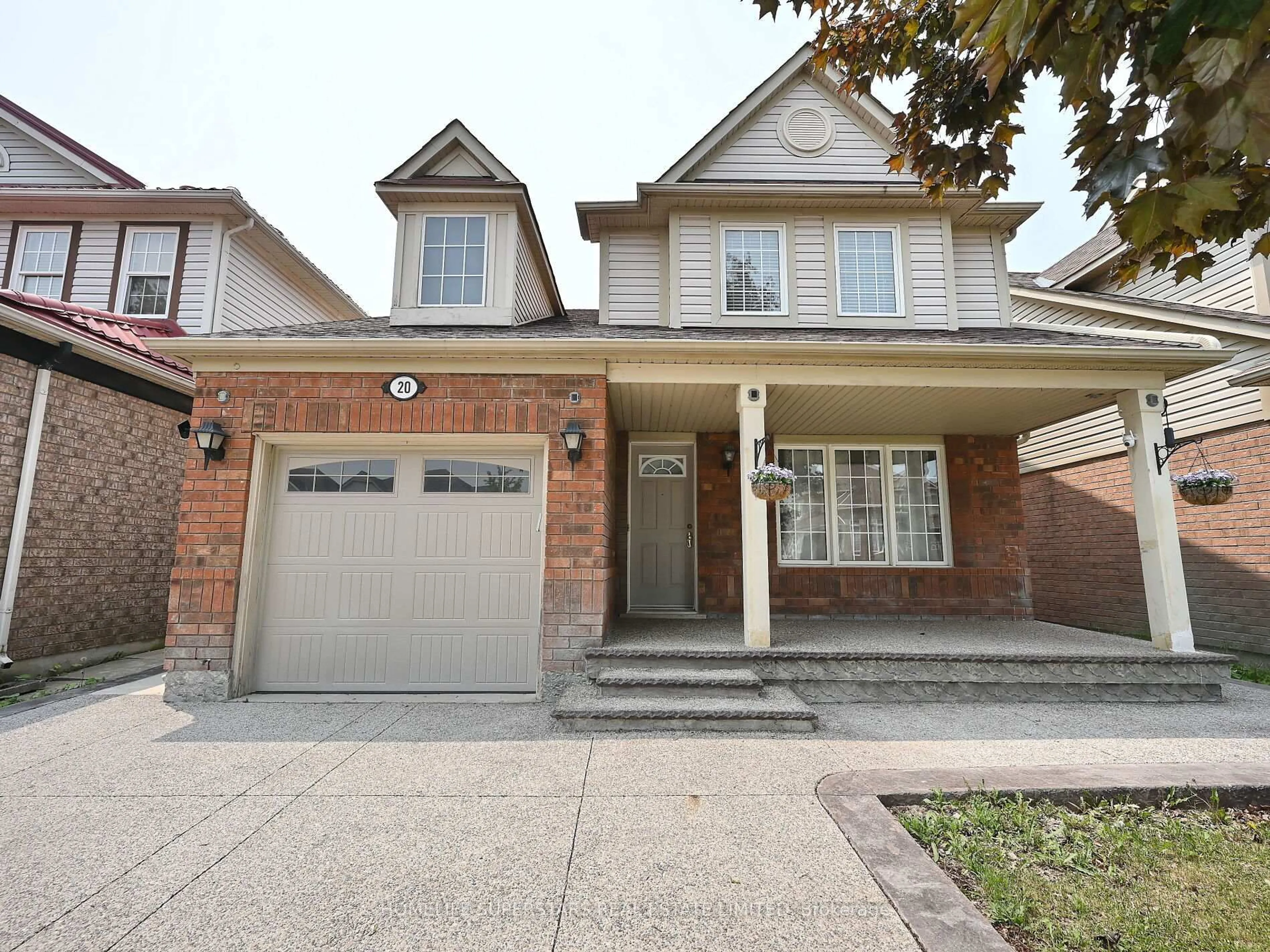 Home with brick exterior material, street for 20 Marshmarigold Dr, Brampton Ontario L7A 2S7