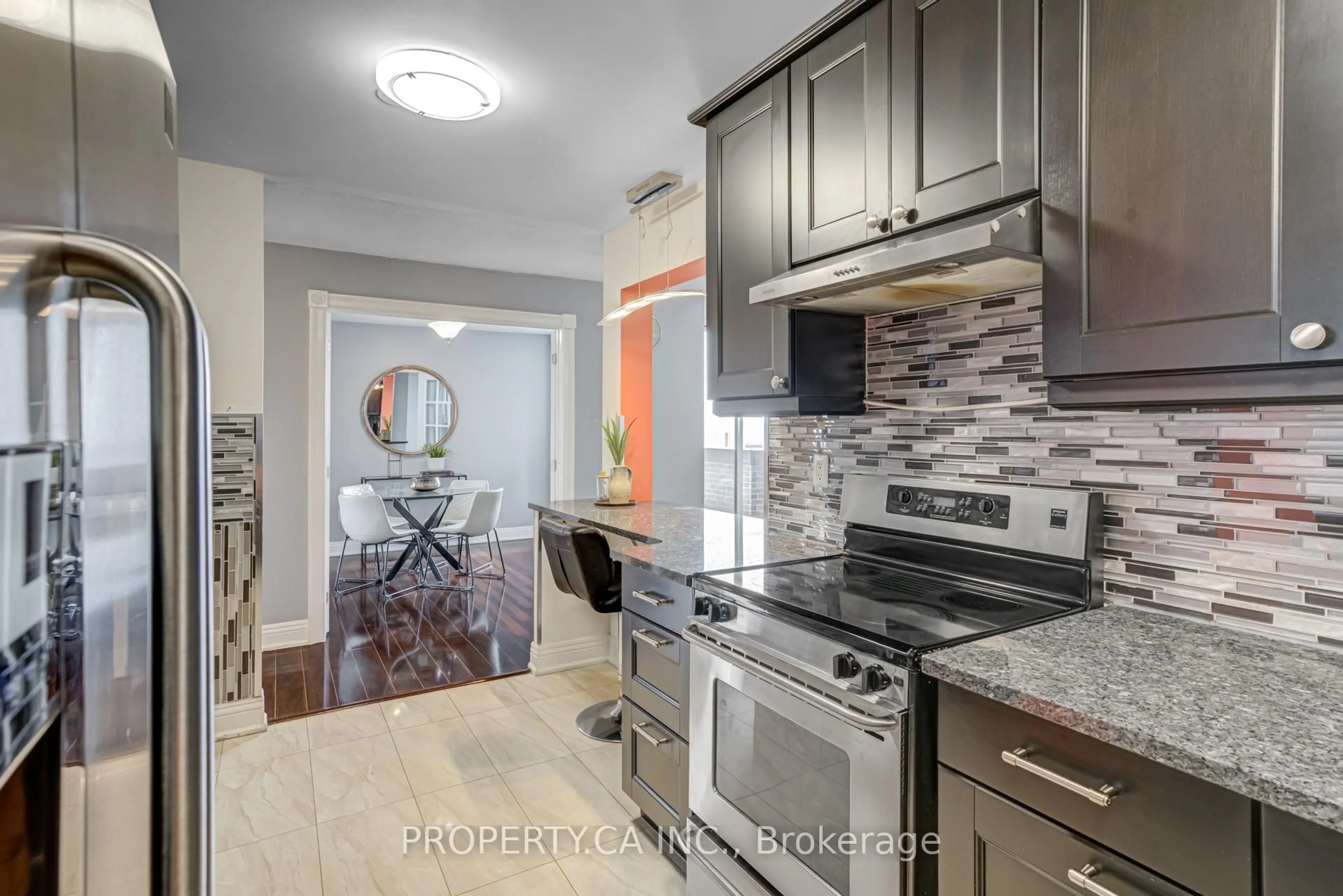 Open concept kitchen, unknown for 1515 Lakeshore Rd #PH5, Mississauga Ontario L5E 3E2
