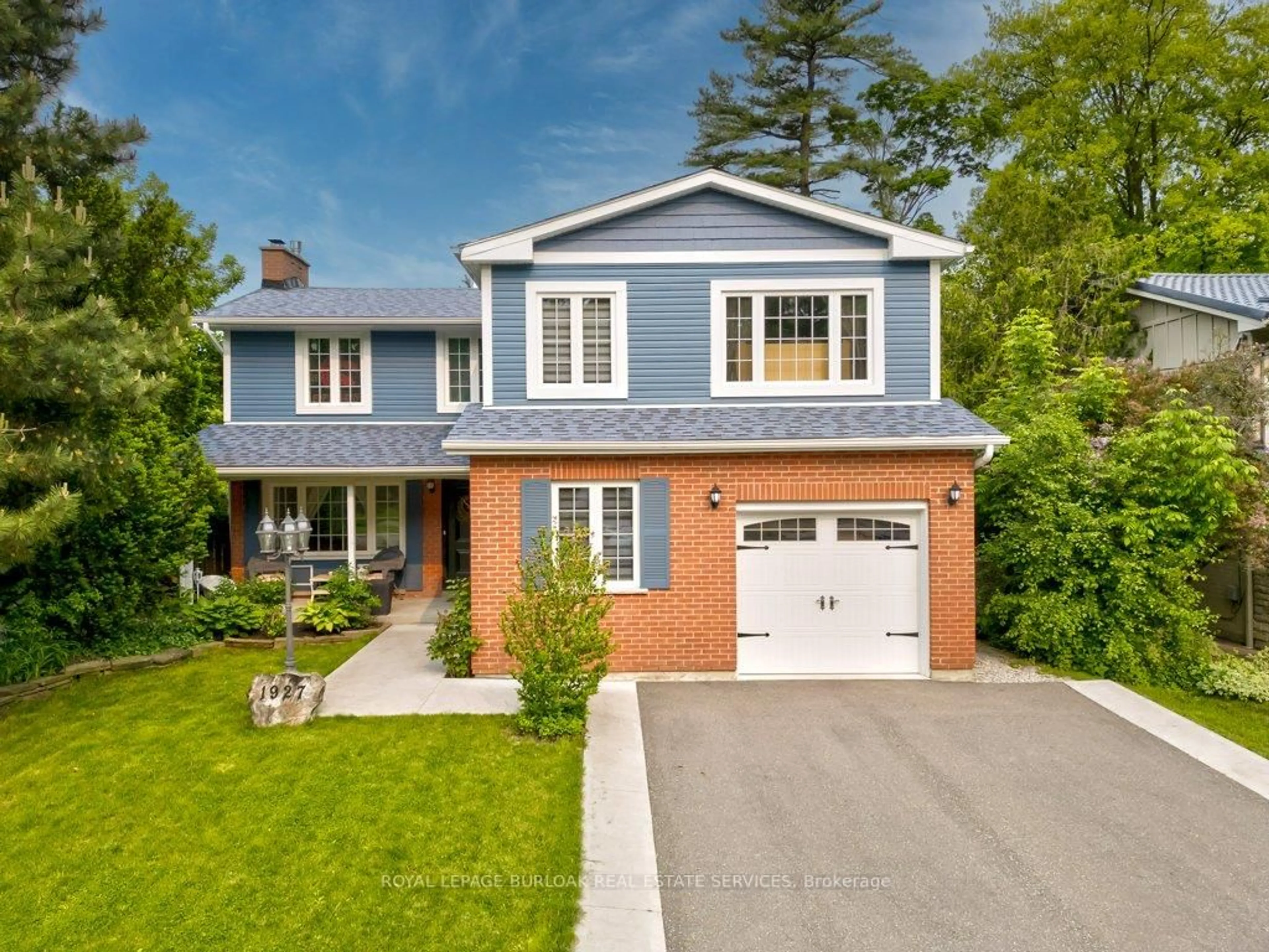 Home with brick exterior material, street for 1927 Truscott Dr, Mississauga Ontario L5J 2A3