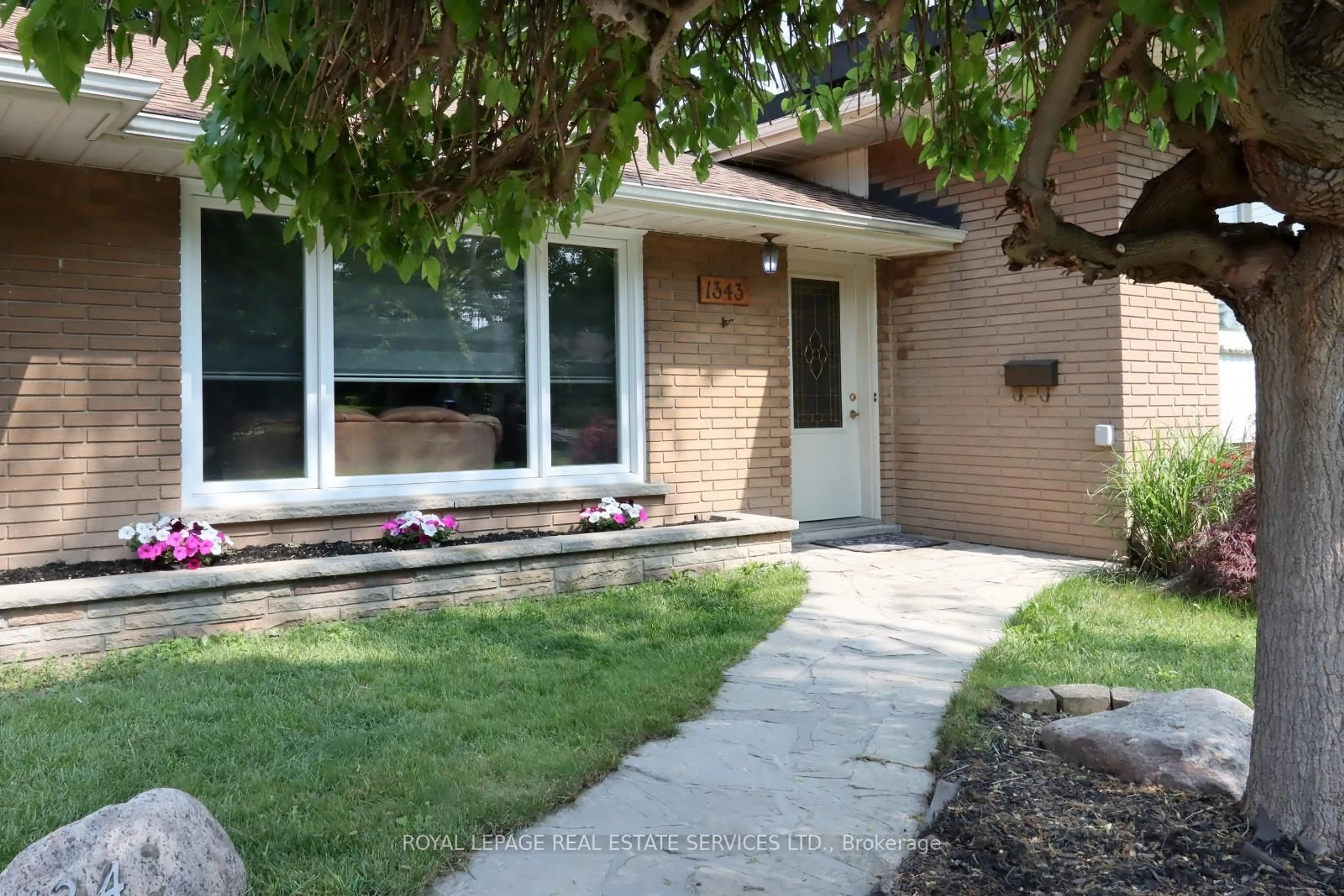 Home with brick exterior material, street for 1343 Melton Dr, Mississauga Ontario L4Y 1L6