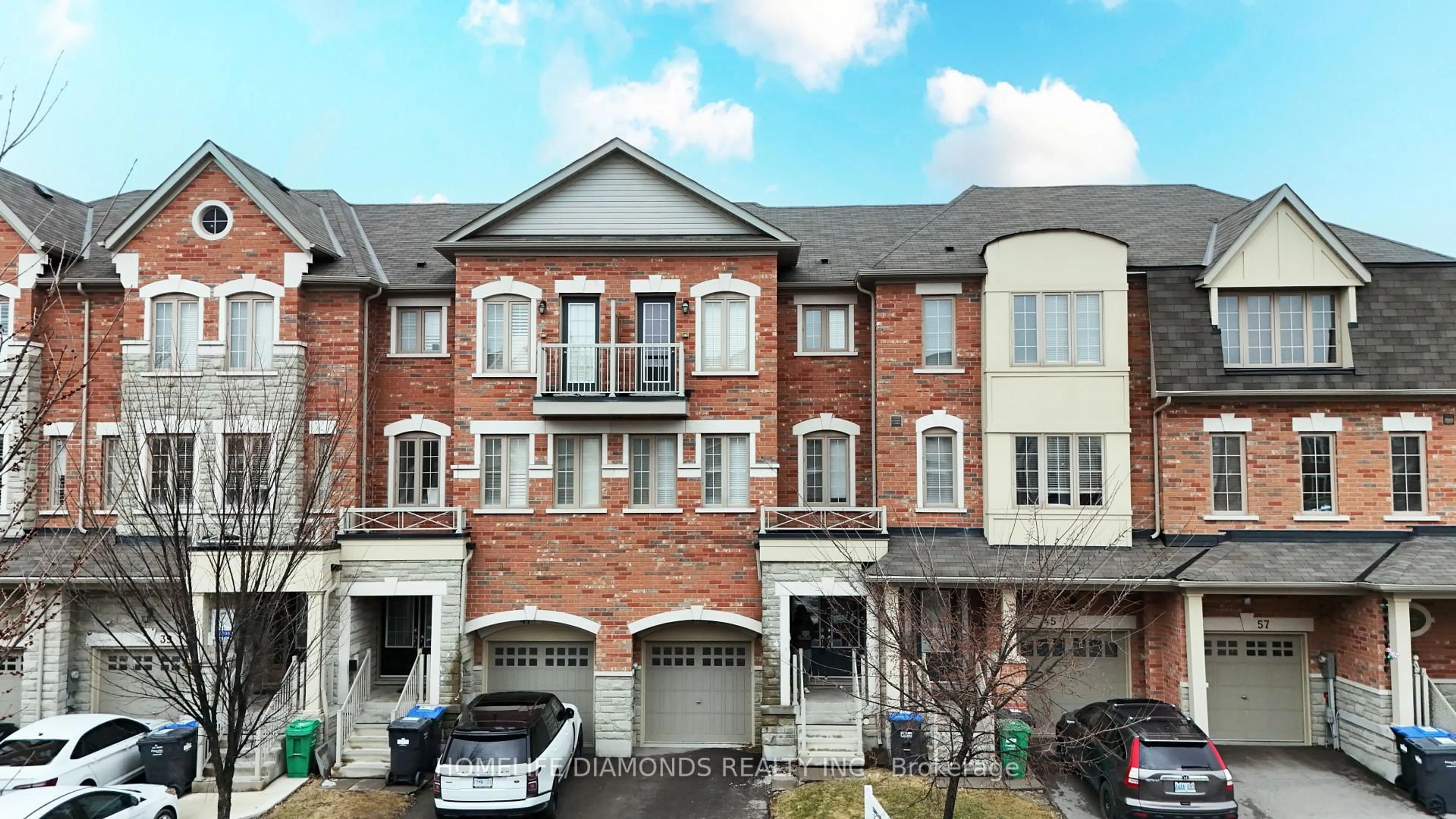Home with brick exterior material, street for 43 Sprucewood Rd, Brampton Ontario L6Z 0B4