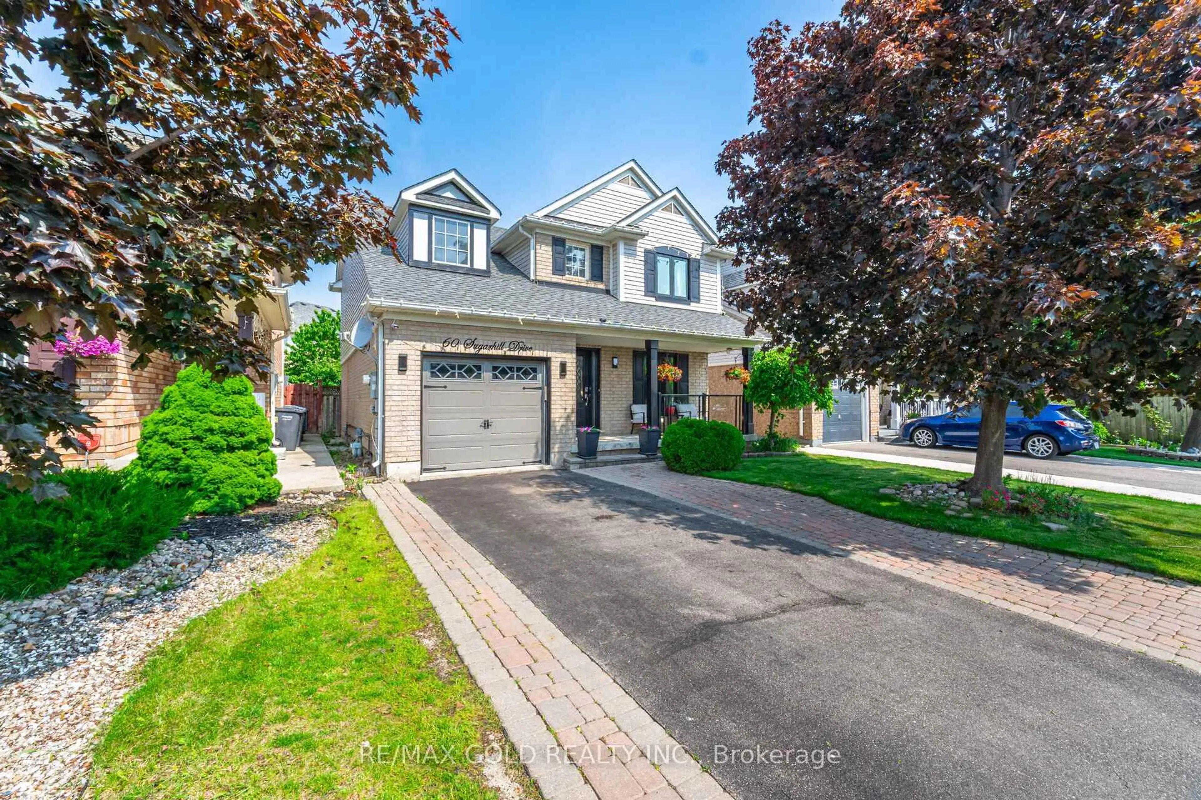 Home with brick exterior material, street for 60 Sugarhill Dr, Brampton Ontario L7A 3N2