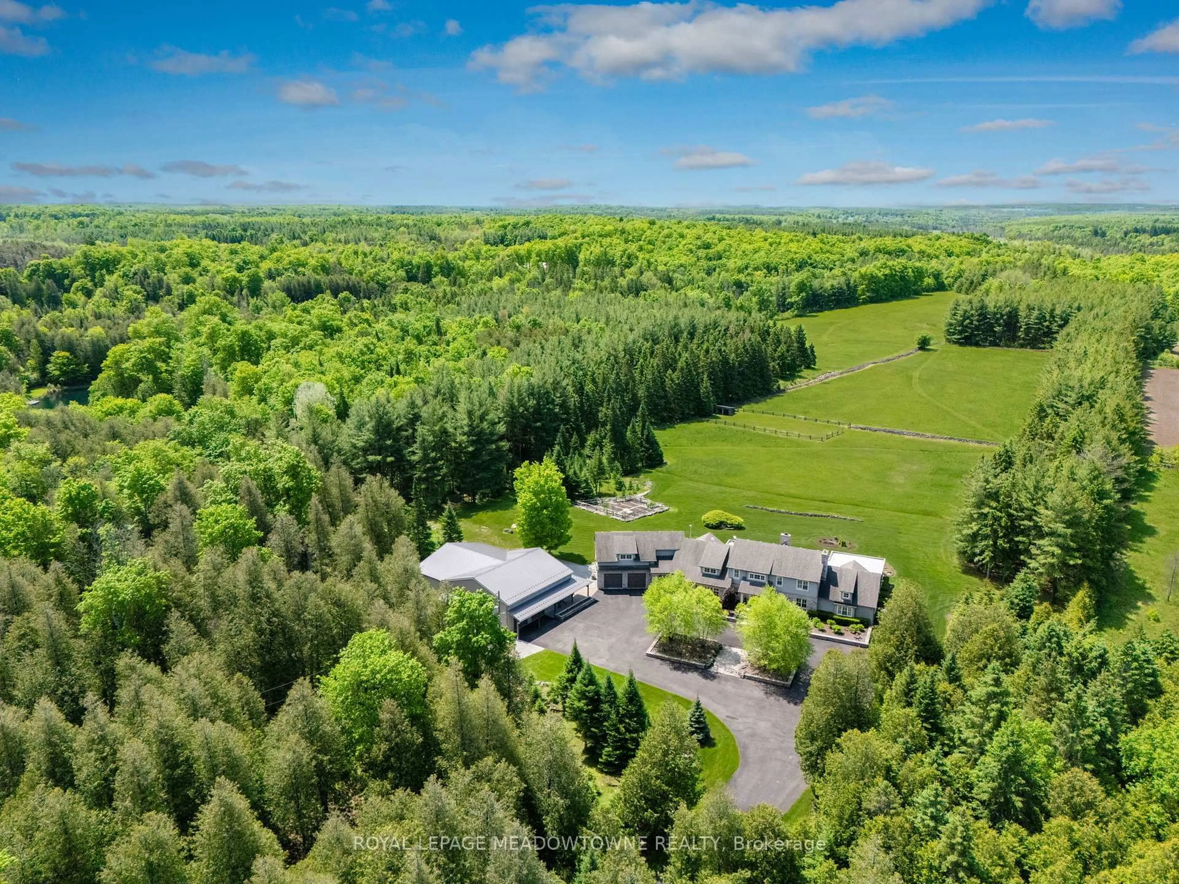 A pic from outside/outdoor area/front of a property/back of a property/a pic from drone, forest/trees view for 13738 Sixth Line, Milton Ontario L7J 2L7