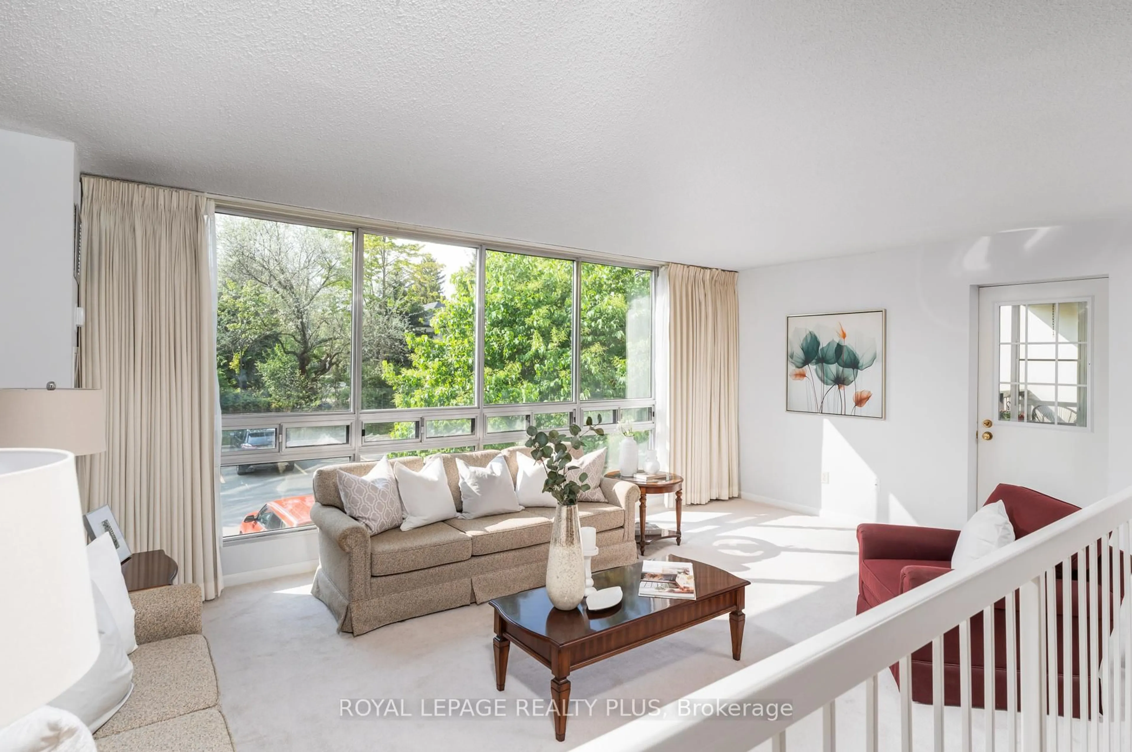 Living room with furniture, unknown for 2185 Marine Dr #206, Oakville Ontario L6L 5L6