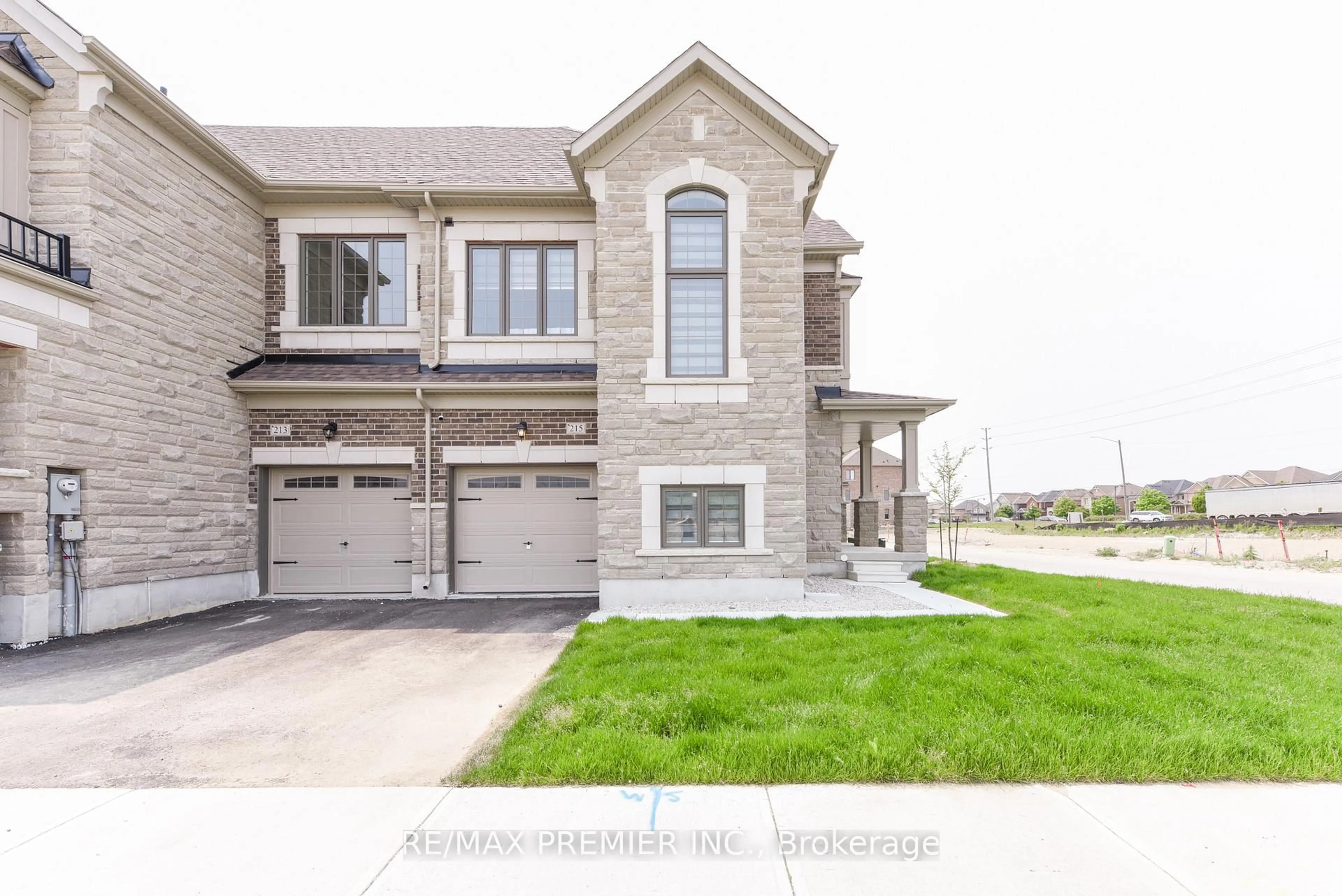 Home with brick exterior material, street for 215 Hayrake St, Brampton Ontario L6Z 0A2
