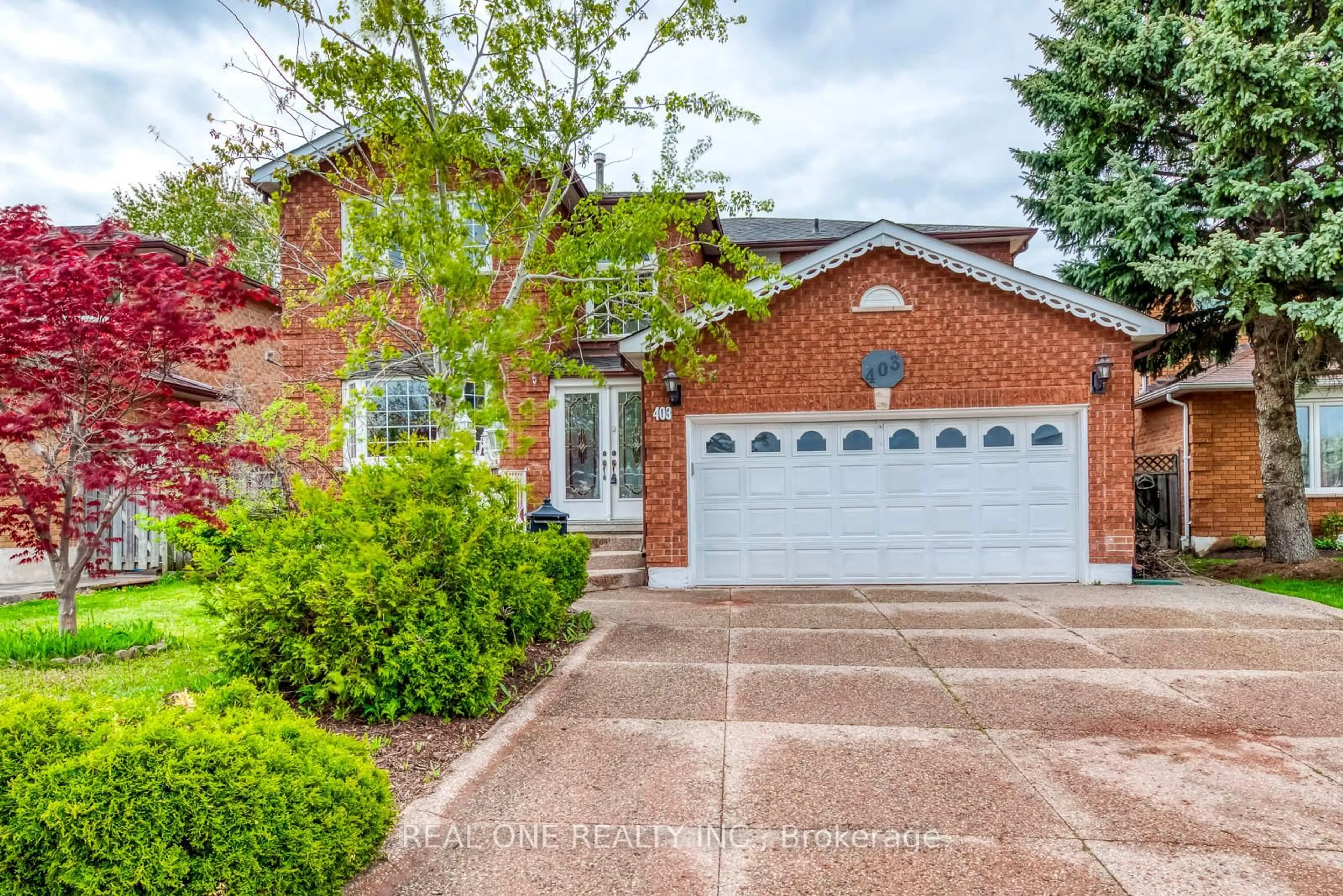 Home with brick exterior material, street for 403 Glenashton Dr, Oakville Ontario L6H 4V7