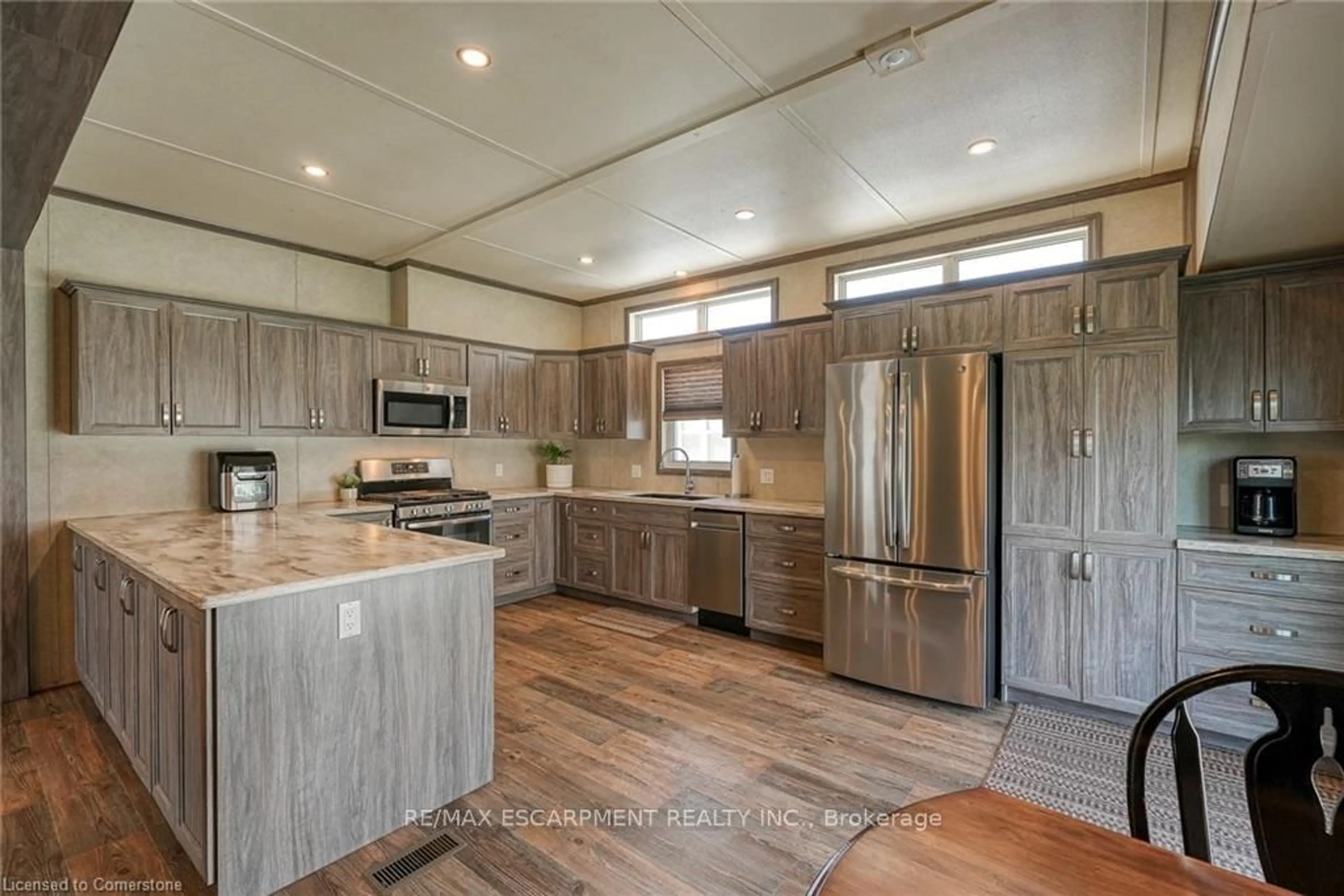 Open concept kitchen, unknown for 4449 Milburough Line #10 Cedar, Burlington Ontario L7P 0P5