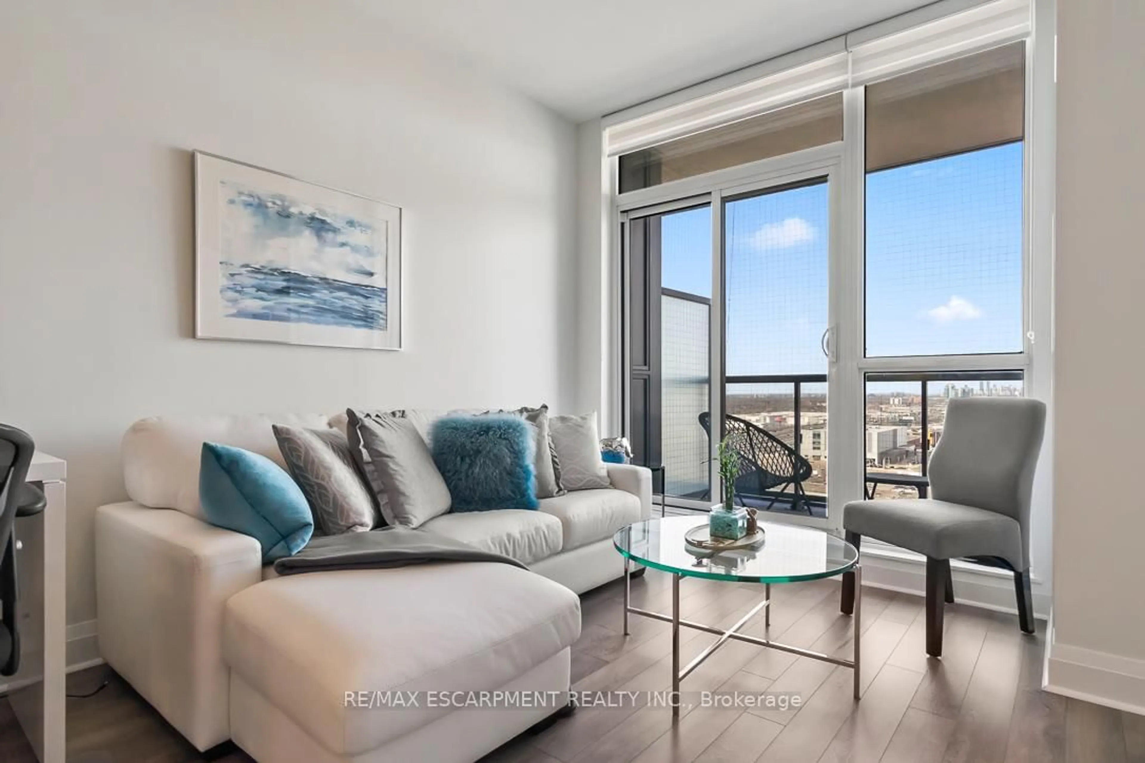 Living room with furniture, wood/laminate floor for 15 Zorra St #1608, Toronto Ontario M8Z 0C1
