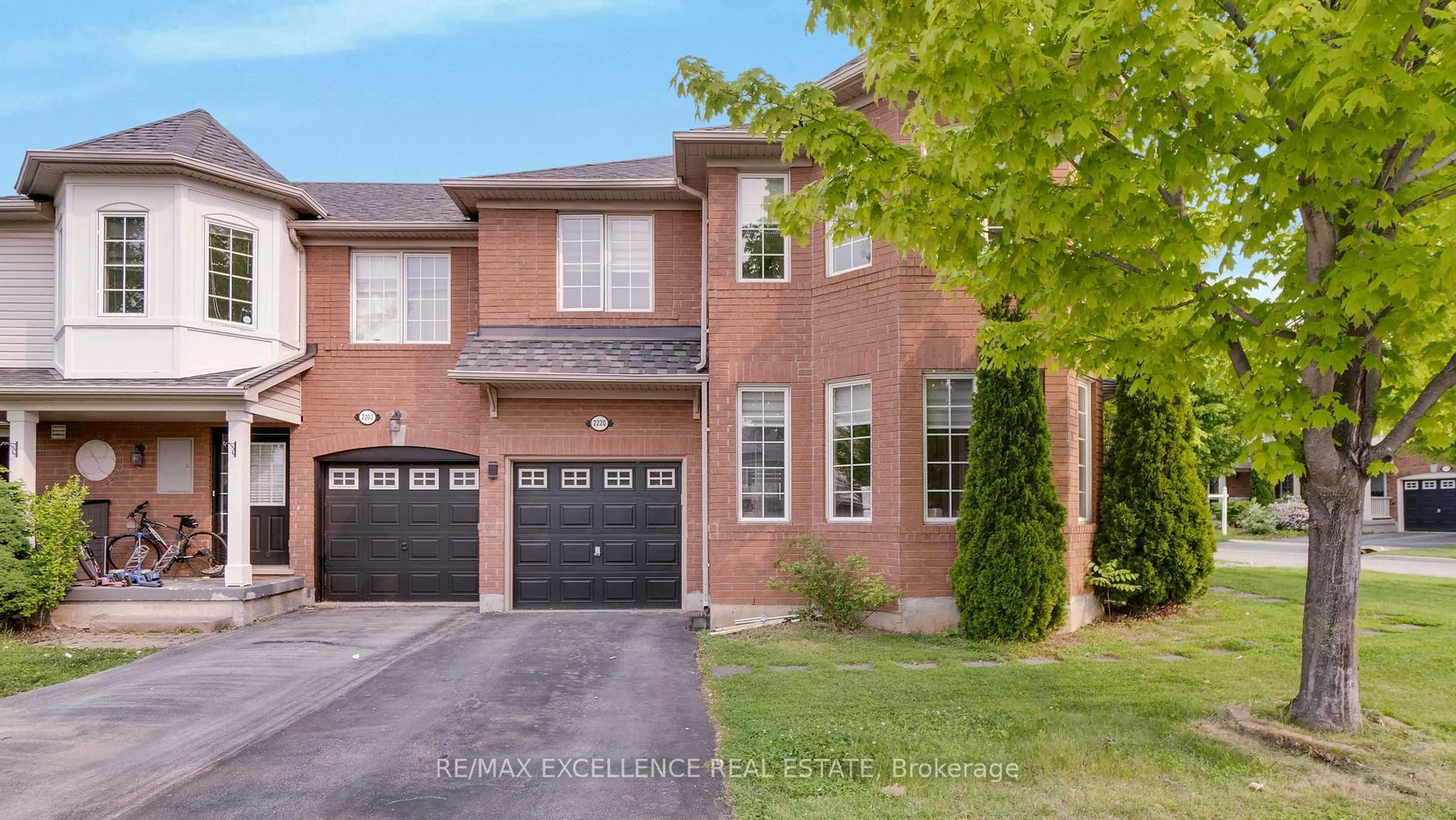 Home with brick exterior material, street for 2220 Amberglen Crt, Oakville Ontario L6M 4W8