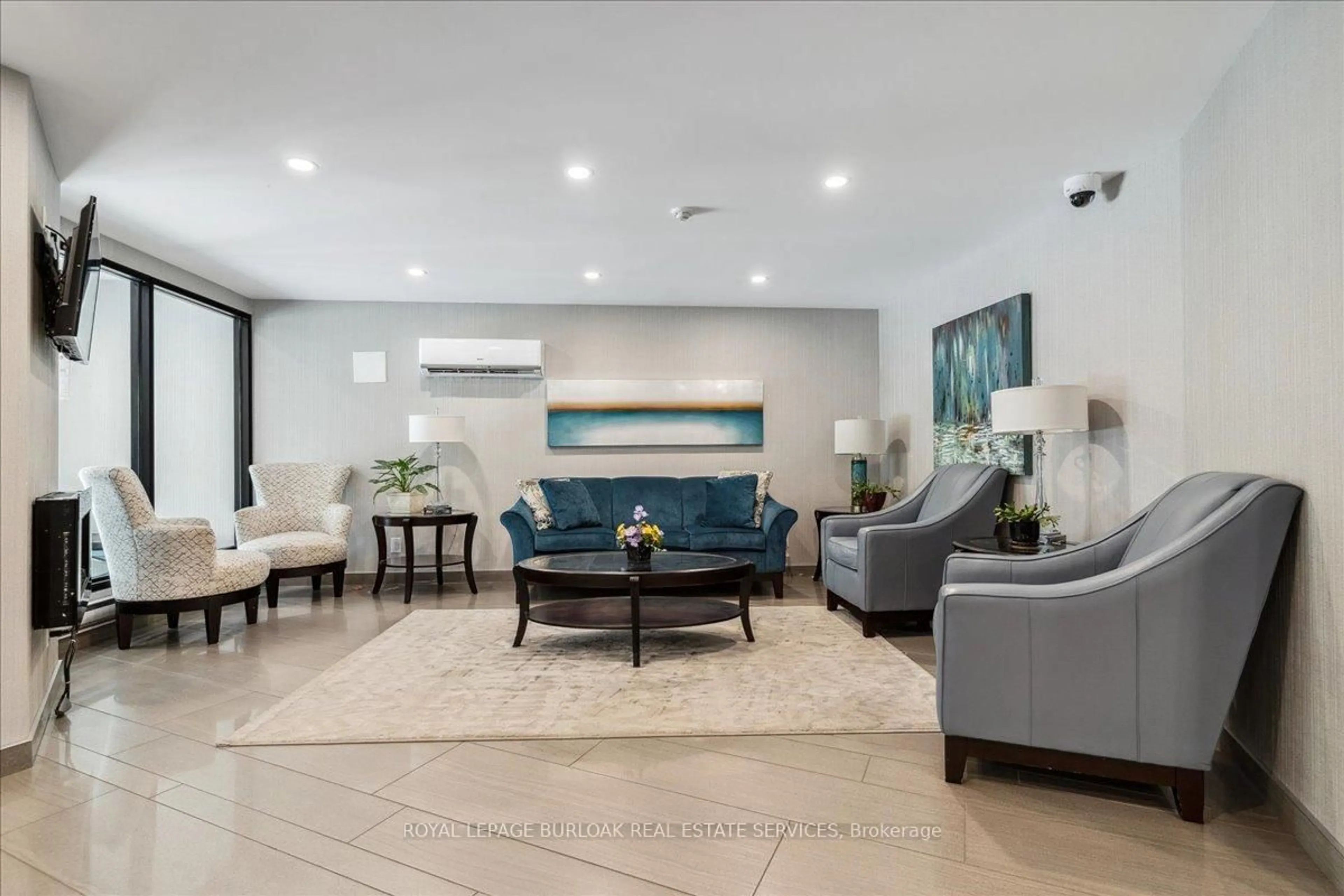 Living room with furniture, unknown for 700 Dynes Rd #206, Burlington Ontario L7N 3M2