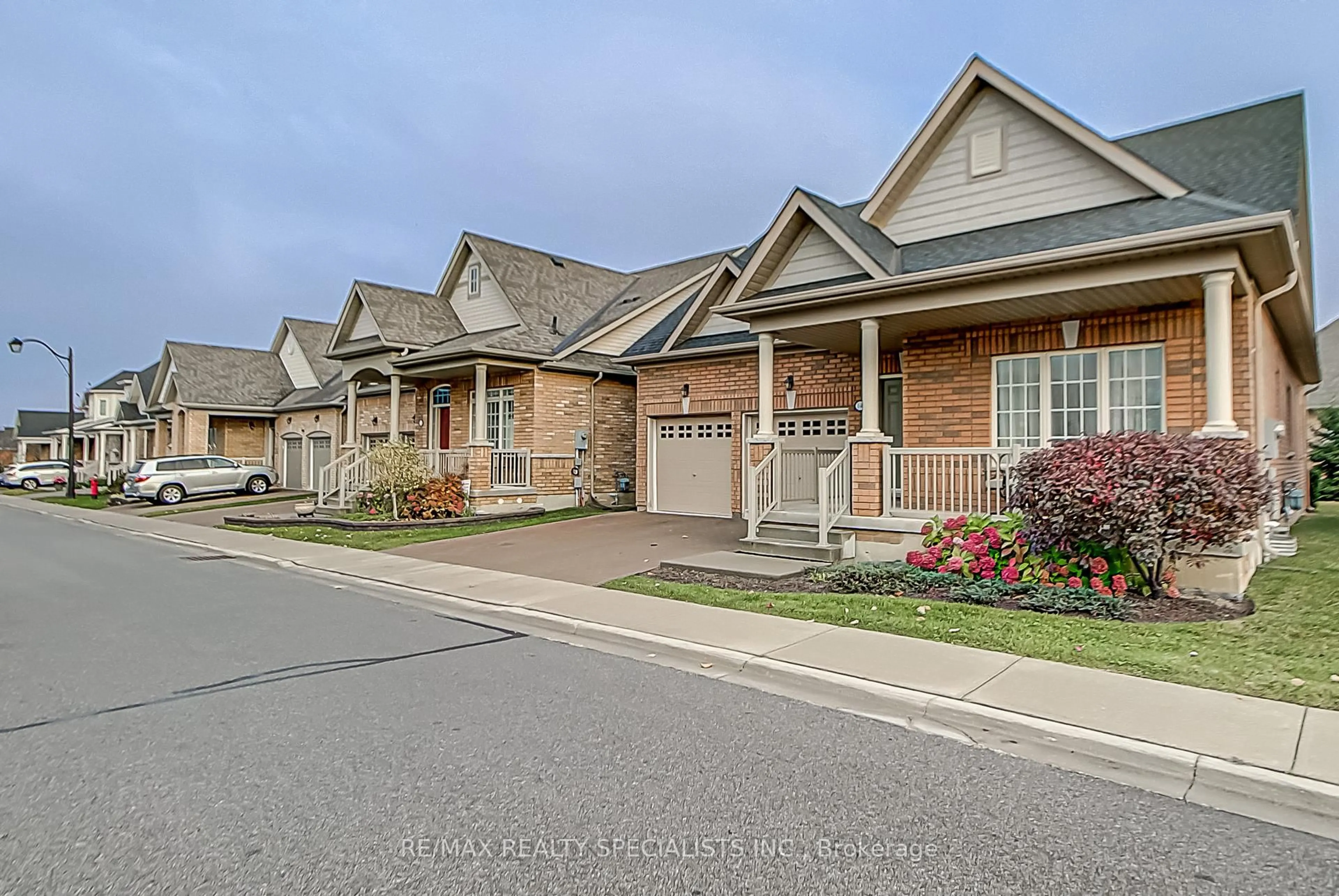 Home with brick exterior material, street for 14 Alamode Rd, Brampton Ontario L6R 3Z8