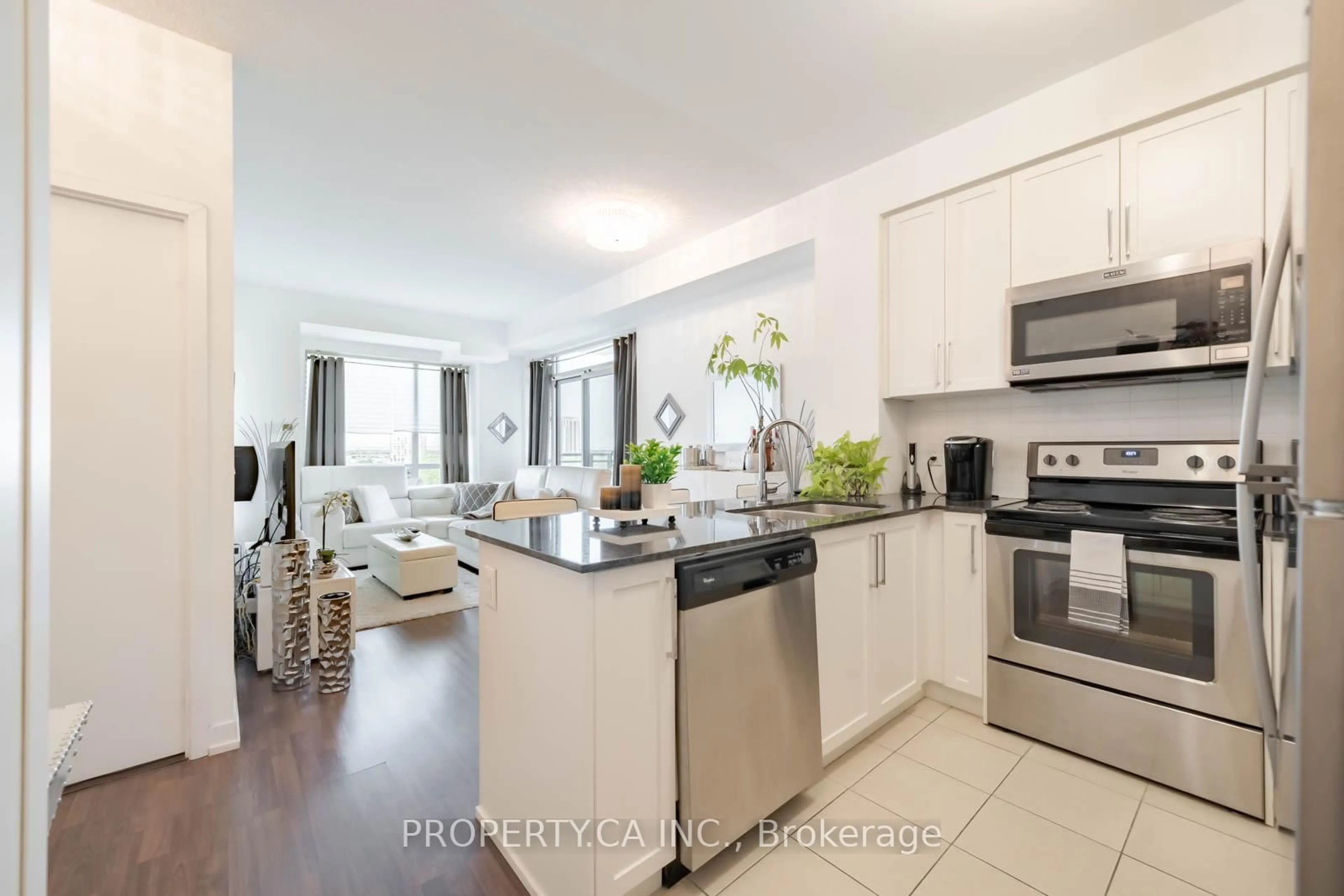 Open concept kitchen, unknown for 840 Queens Plate Dr #704, Toronto Ontario M9W 0E7