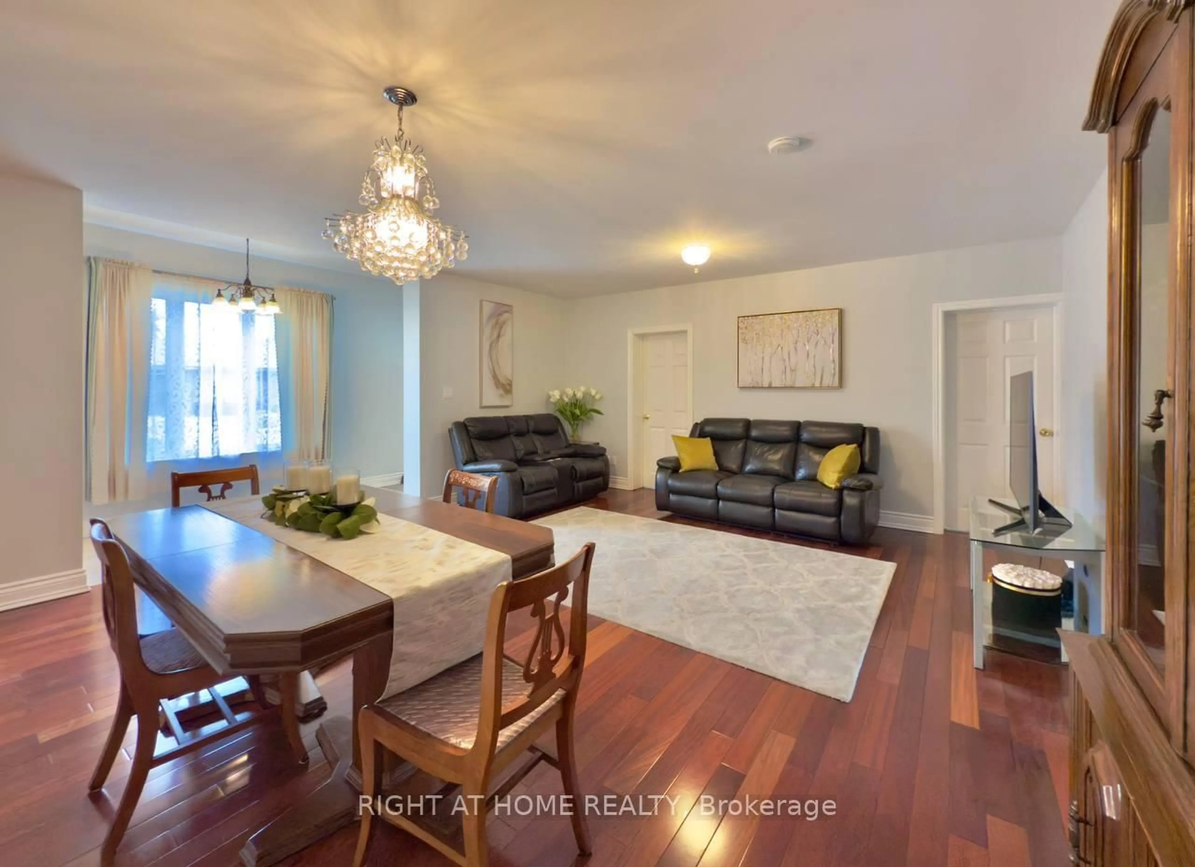 Living room with furniture, wood/laminate floor for 25 Burlingame Rd, Toronto Ontario M8W 1Y7