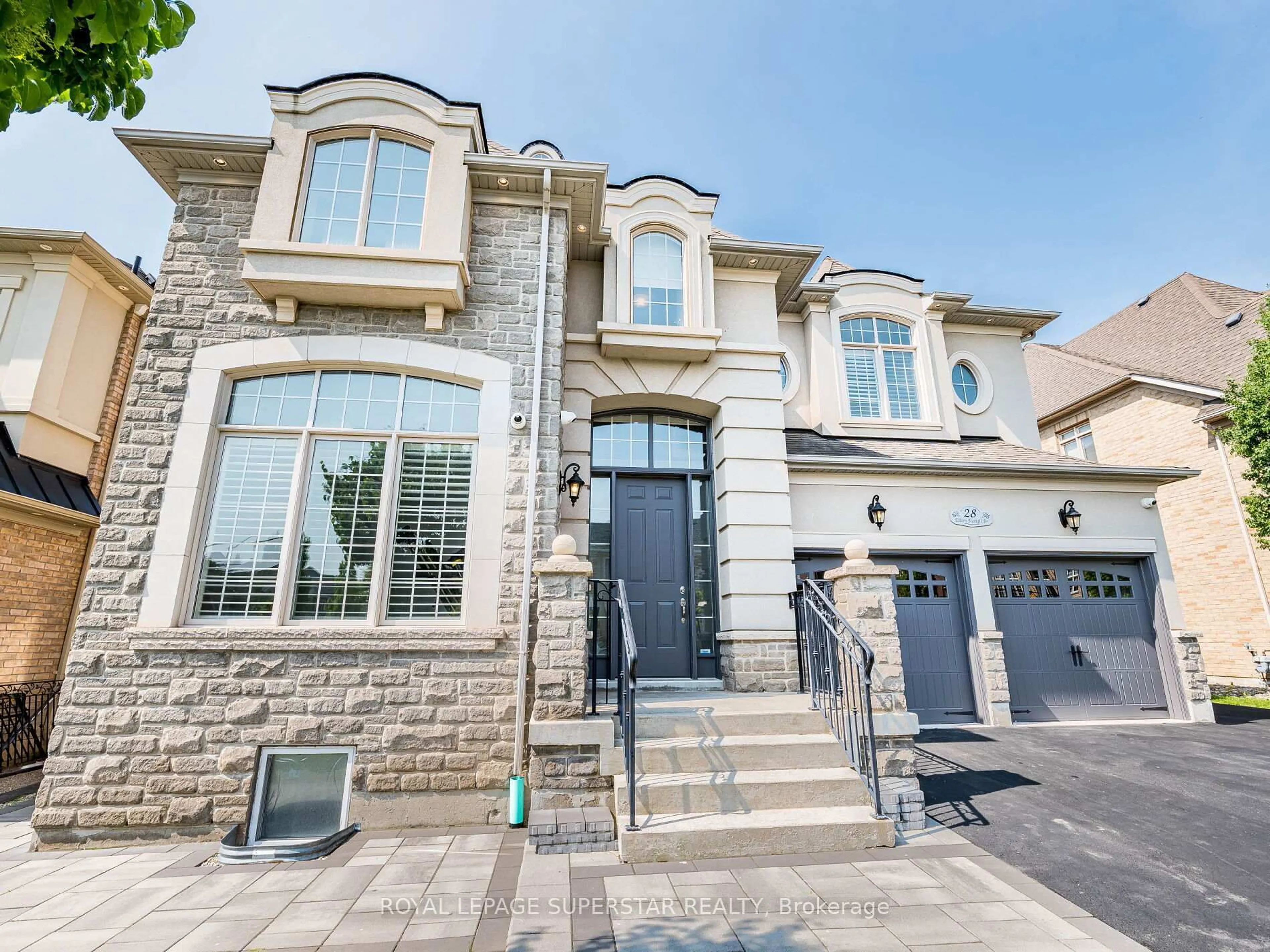 Home with brick exterior material, street for 28 Elbern Markell Dr, Brampton Ontario L6X 2X5