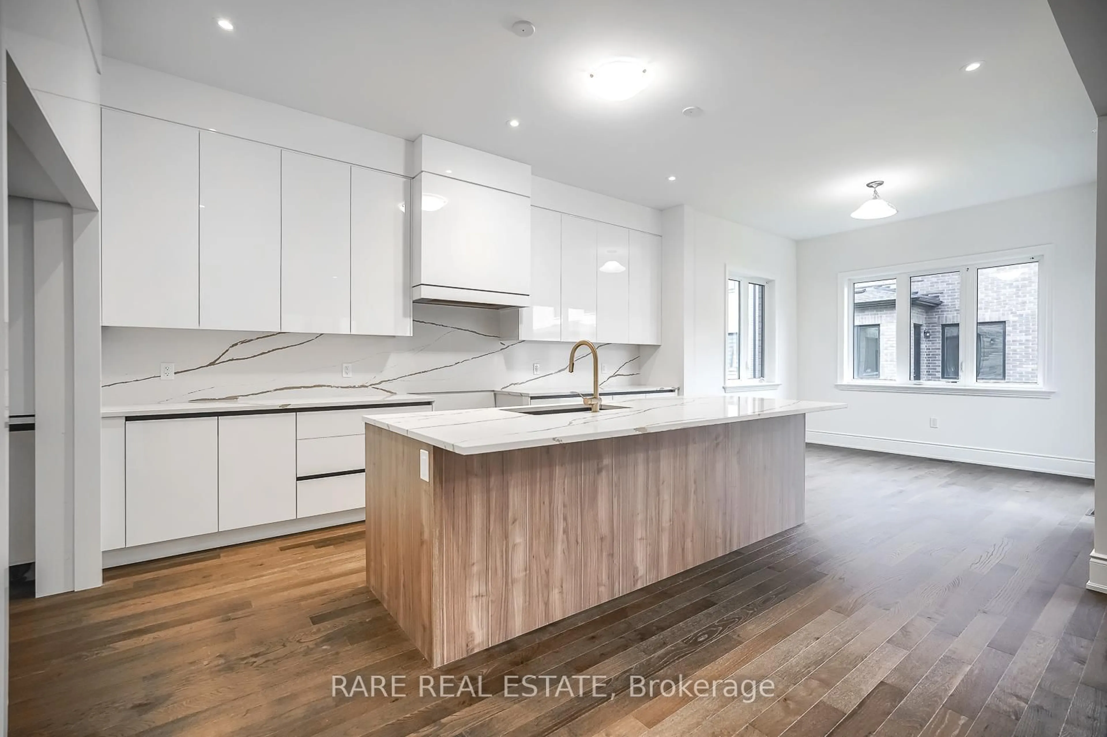 Open concept kitchen, wood/laminate floor for 1212 Queens Plate Rd, Oakville Ontario L6M 5M3