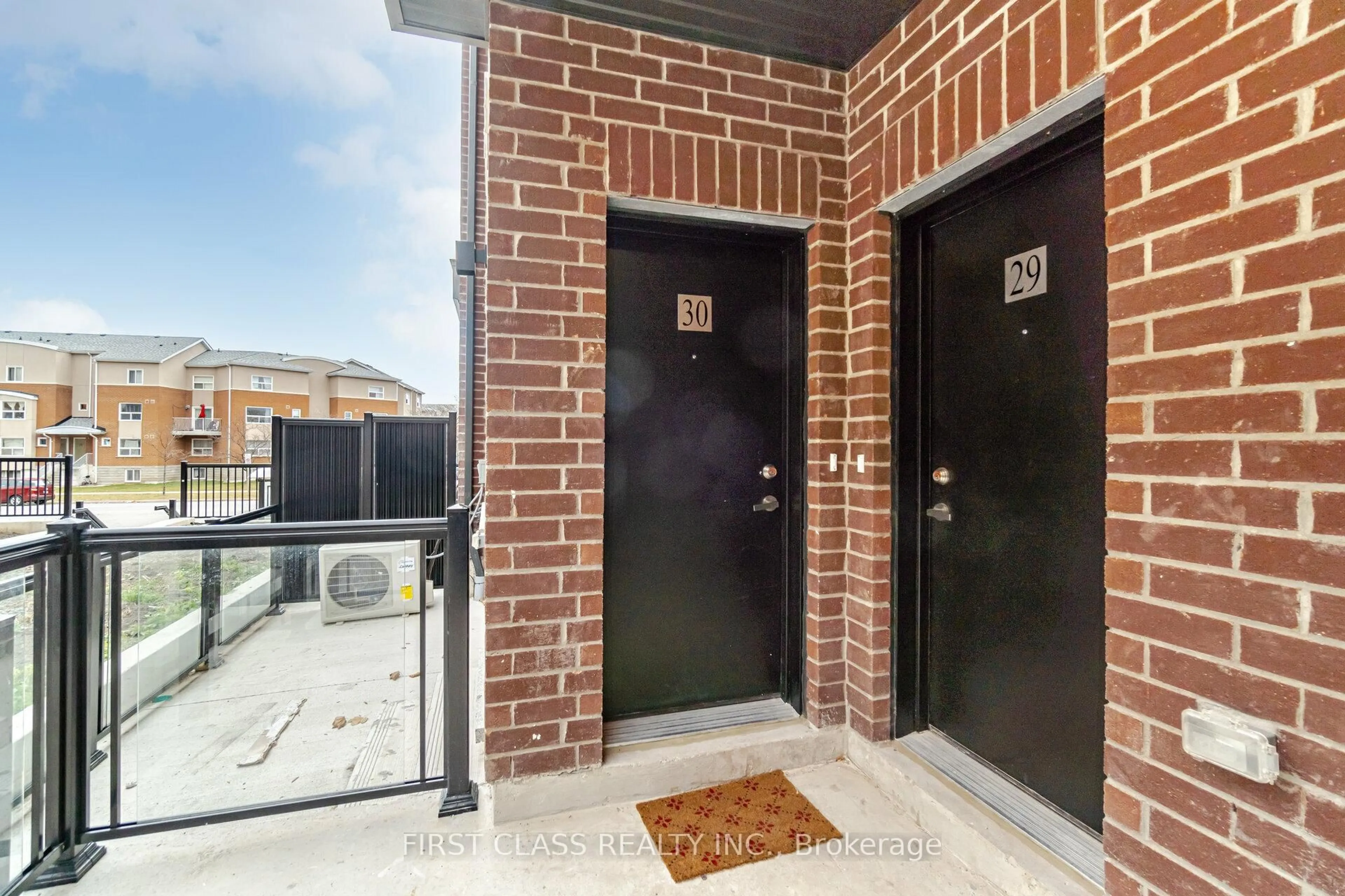Home with brick exterior material, street for 3405 Ridgeway Dr #30, Mississauga Ontario L5T 5T3
