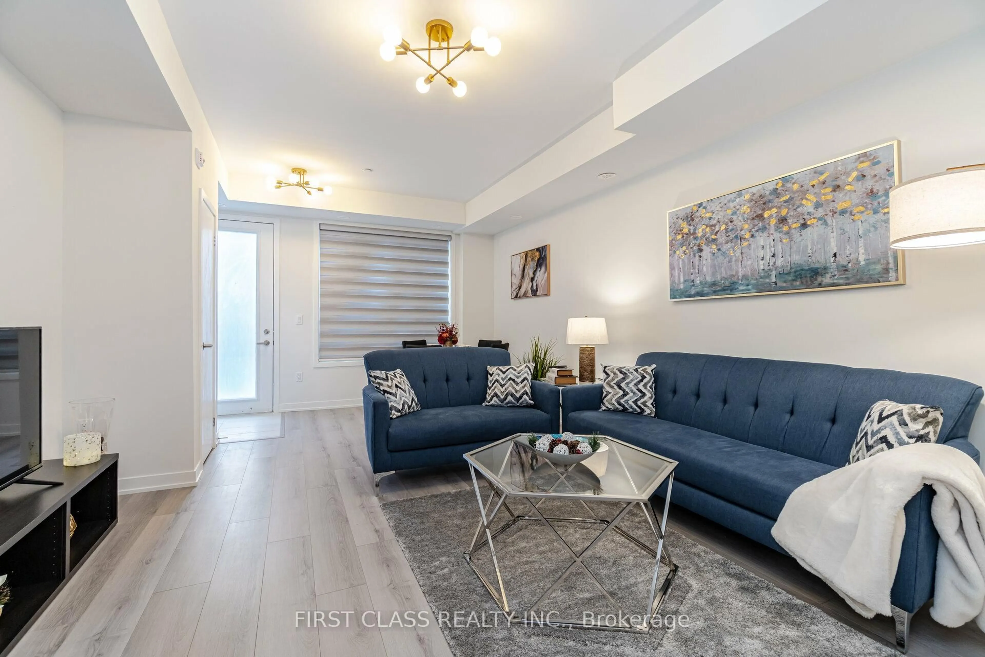 Living room with furniture, unknown for 3405 Ridgeway Dr #30, Mississauga Ontario L5T 5T3