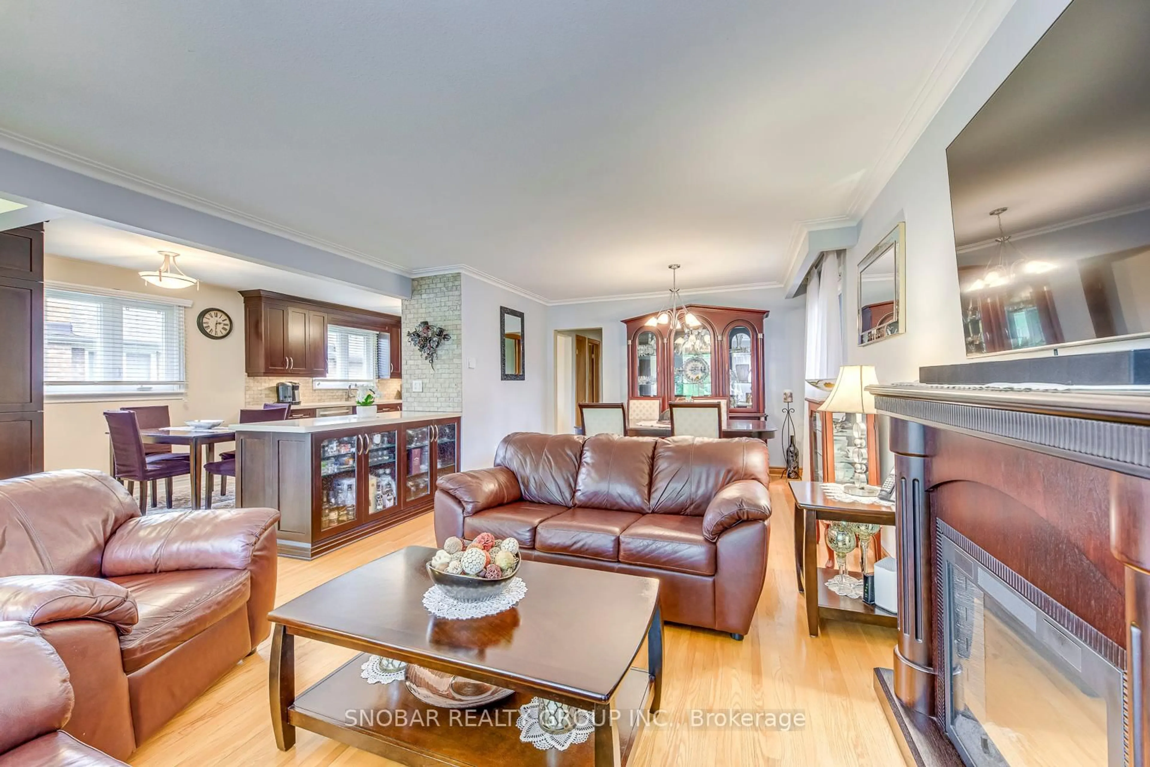 Living room with furniture, wood/laminate floor for 46 Northcrest Rd, Toronto Ontario M9R 1P9
