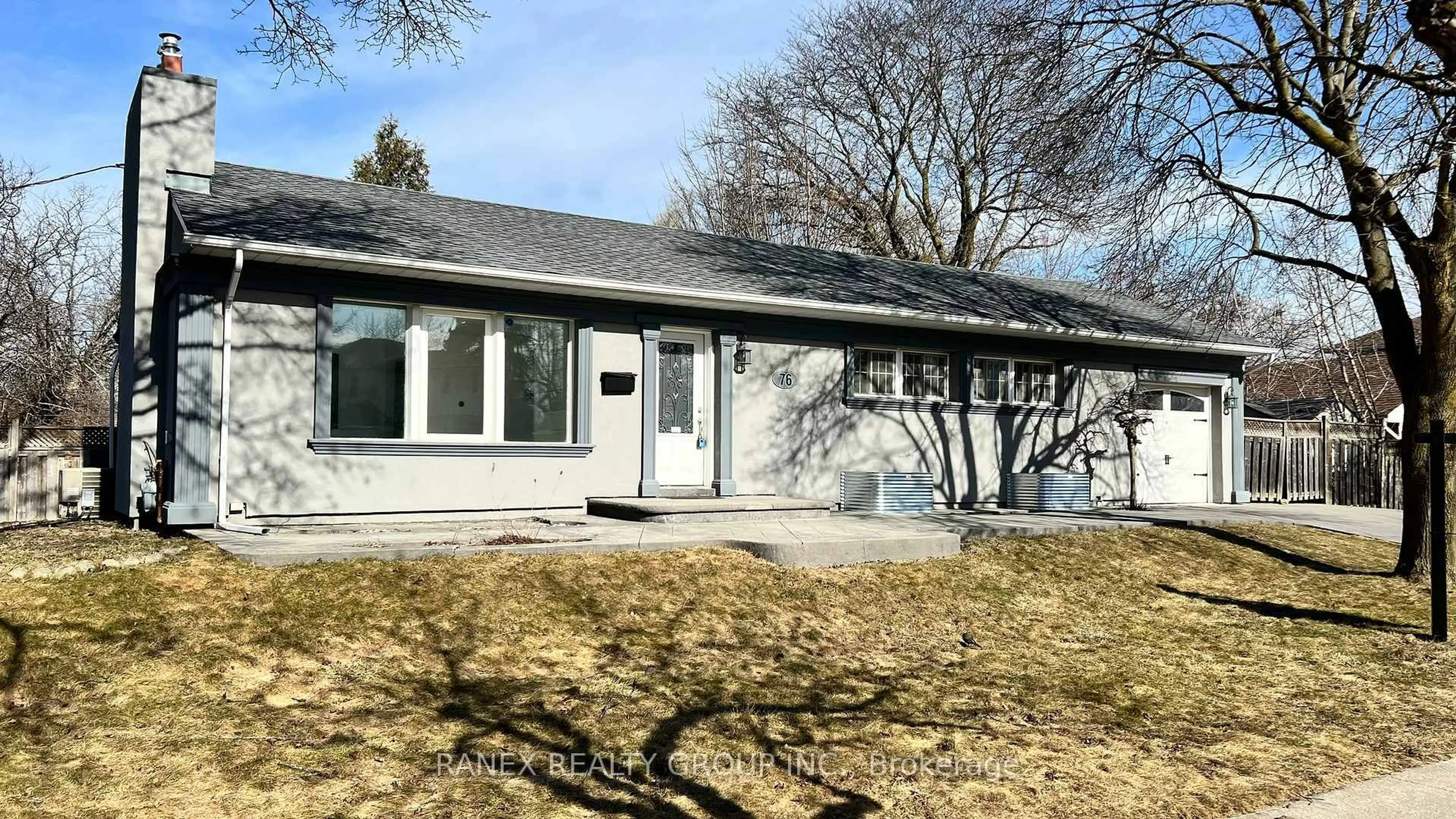 Home with vinyl exterior material, street for 76 Eldomar Ave, Brampton Ontario L6W 1R3