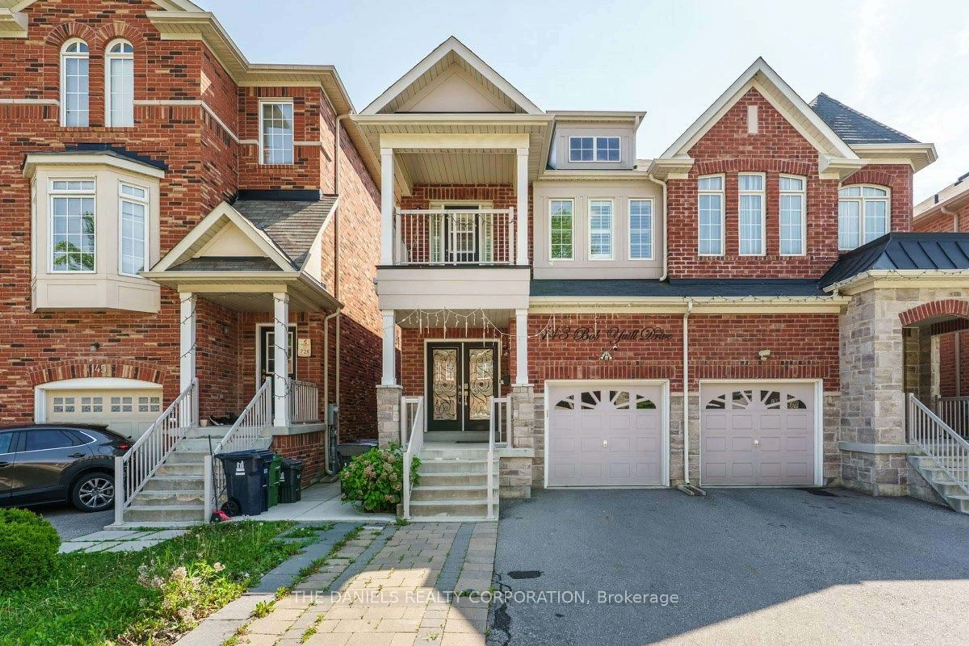 Home with brick exterior material, street for 143 Bob Yuill Dr, Toronto Ontario M9M 0B1