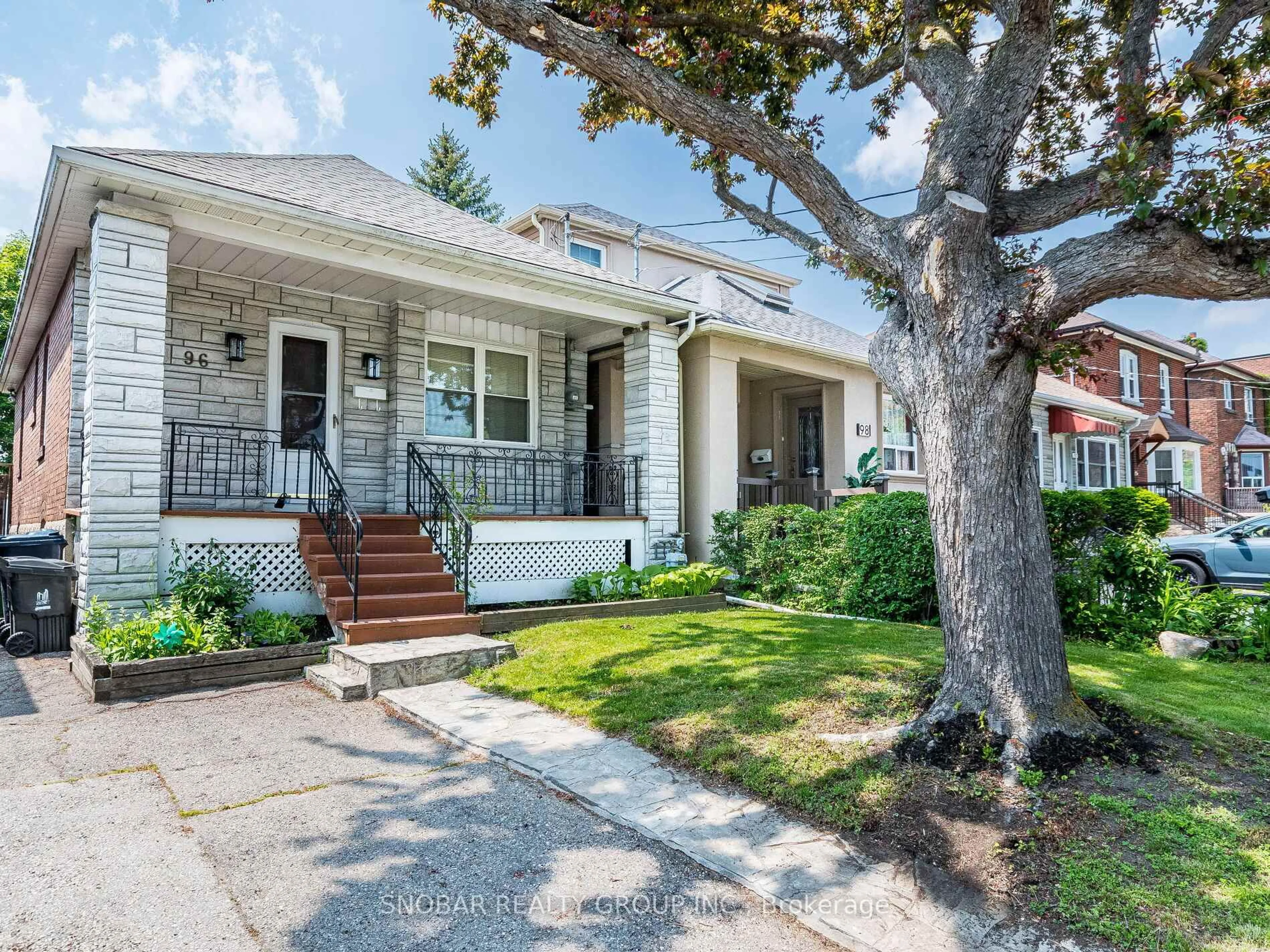 Home with brick exterior material, street for 96 Eleventh St, Toronto Ontario M8V 3G5