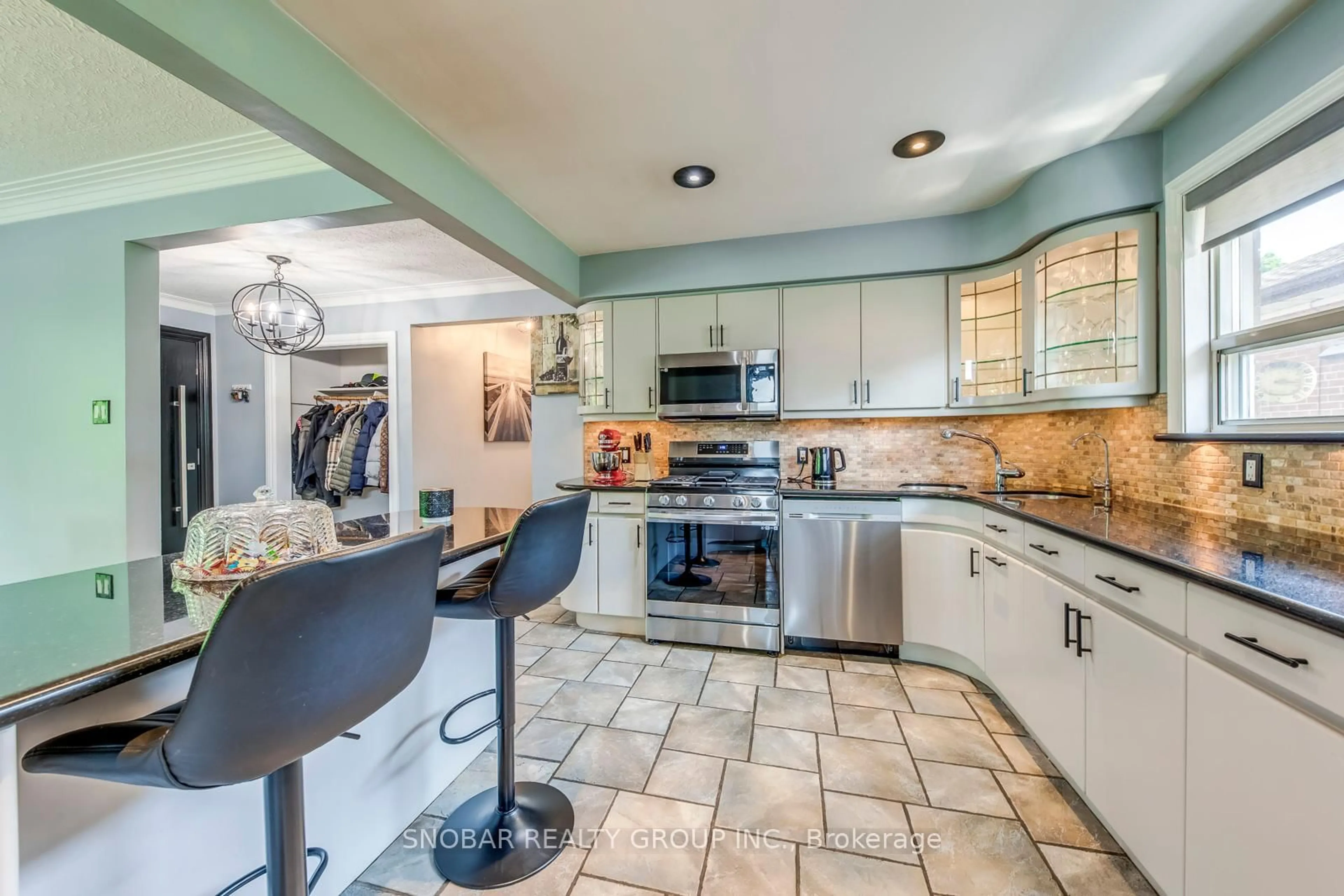 Open concept kitchen, ceramic/tile floor for 53 Fenley Dr, Toronto Ontario M9R 1M5