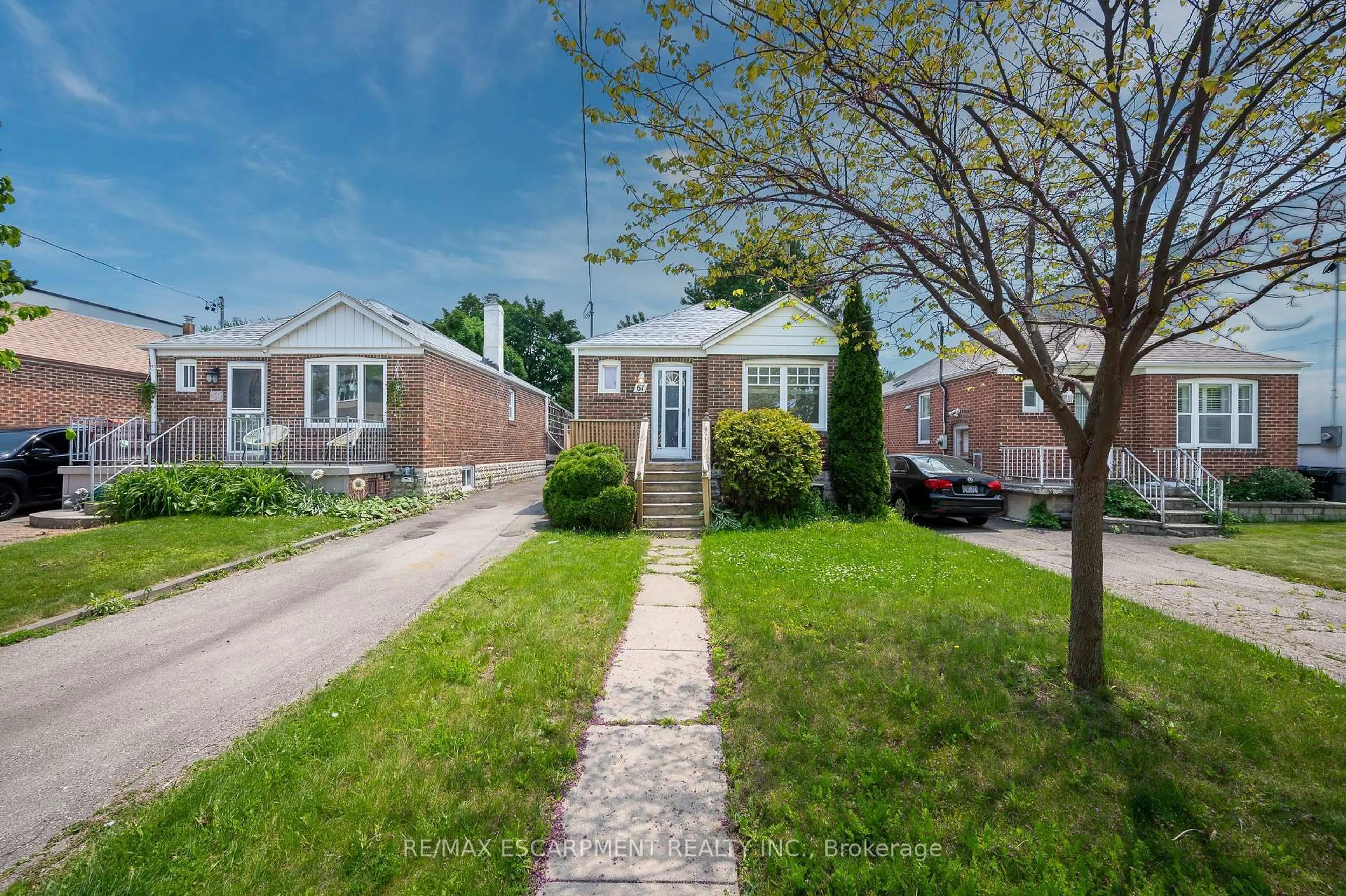 Home with brick exterior material, street for 61 Struthers St, Toronto Ontario M8V 1Y2