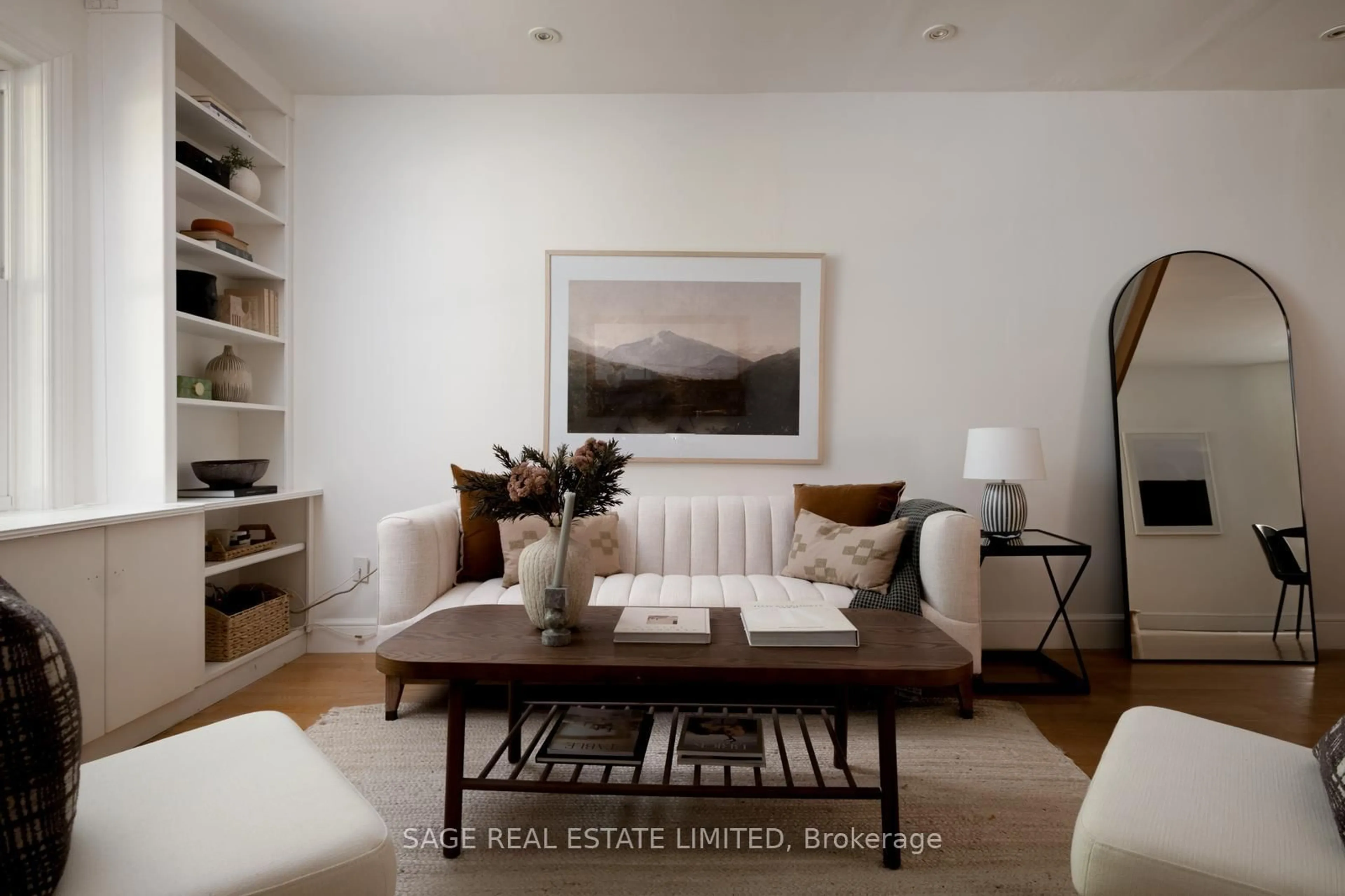 Living room with furniture, wood/laminate floor for 166 Bartlett Ave, Toronto Ontario M6H 3G1