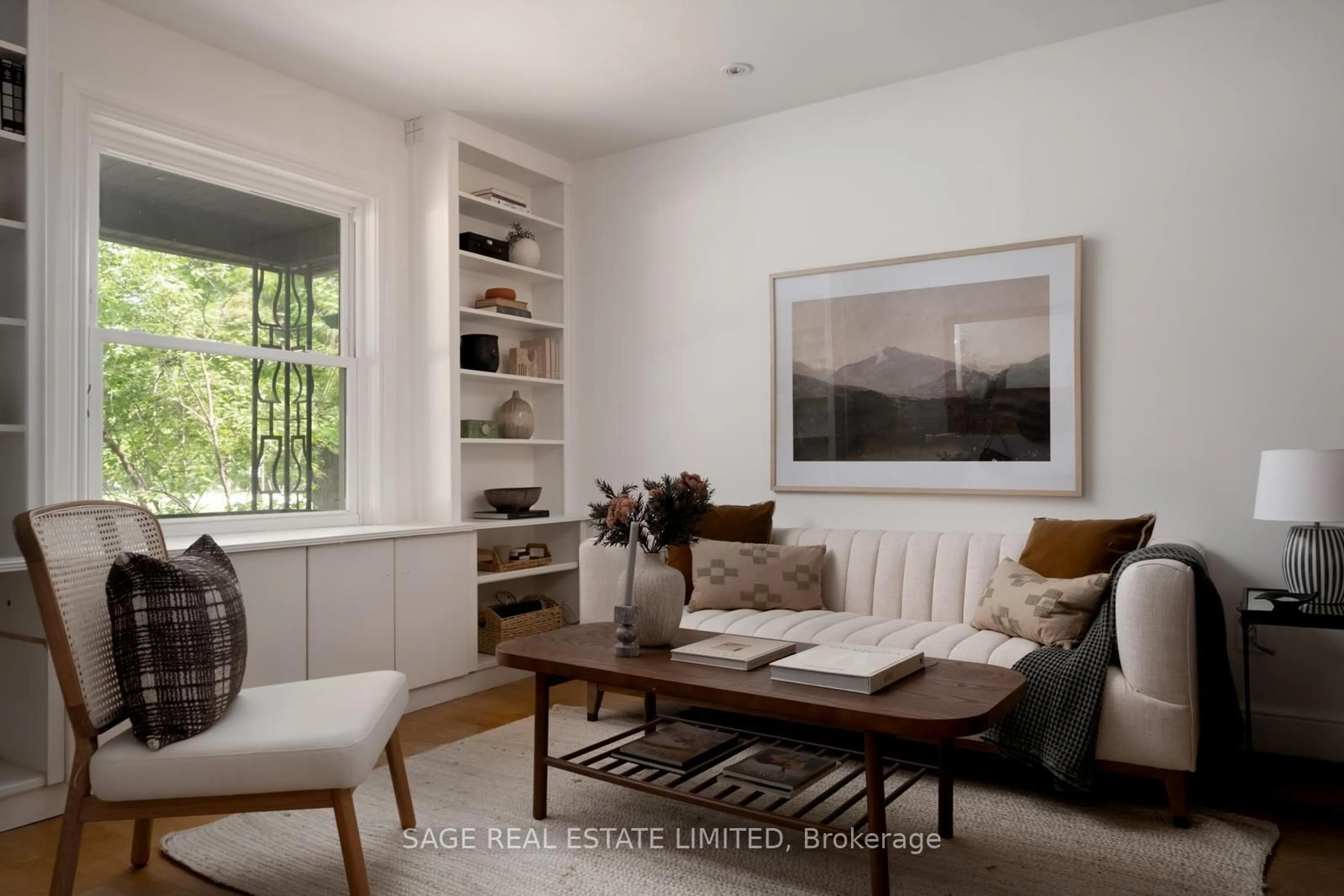 Living room with furniture, wood/laminate floor for 166 Bartlett Ave, Toronto Ontario M6H 3G1