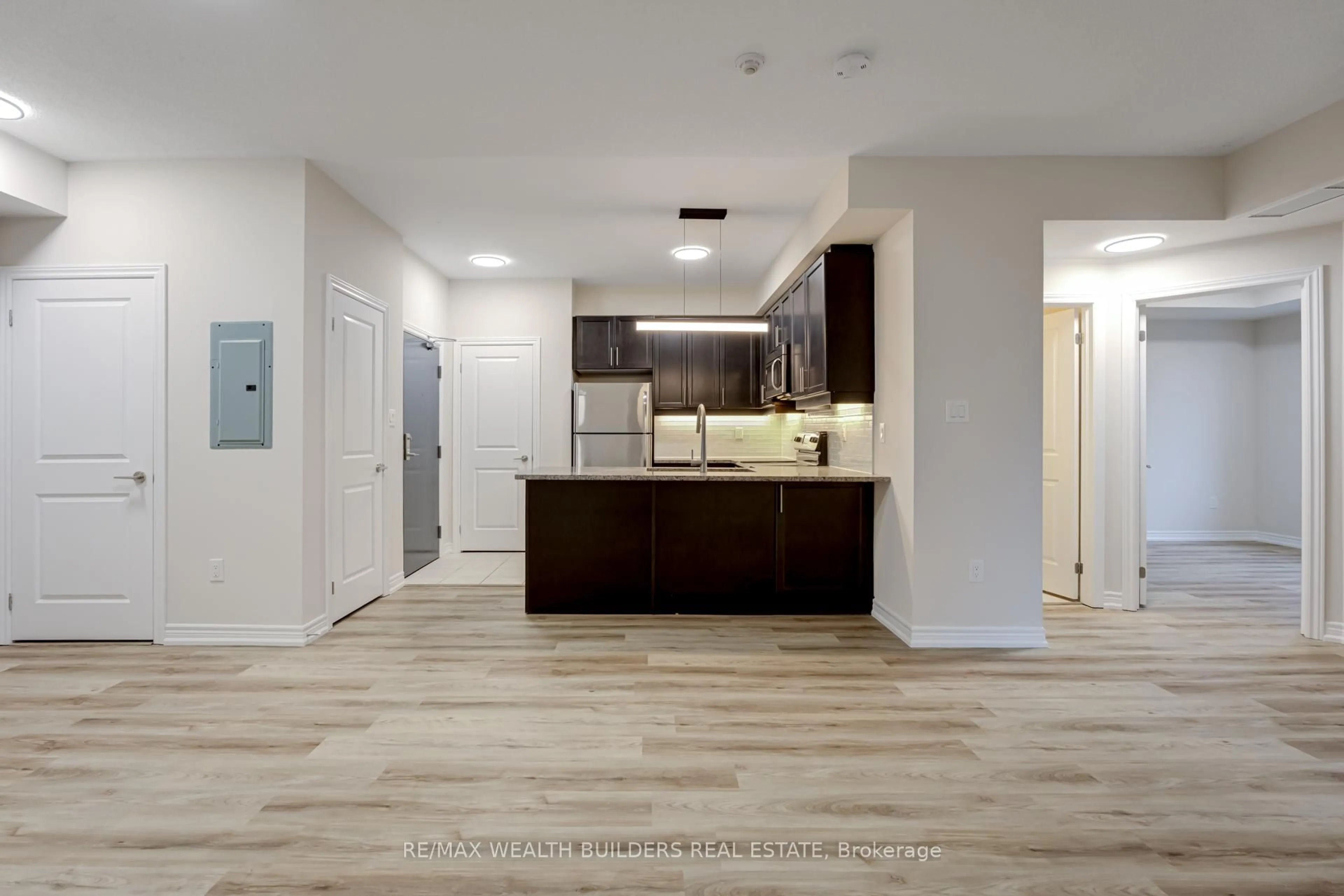 Open concept kitchen, unknown for 2333 Sawgrass Dr #202, Oakville Ontario L6H 0L2