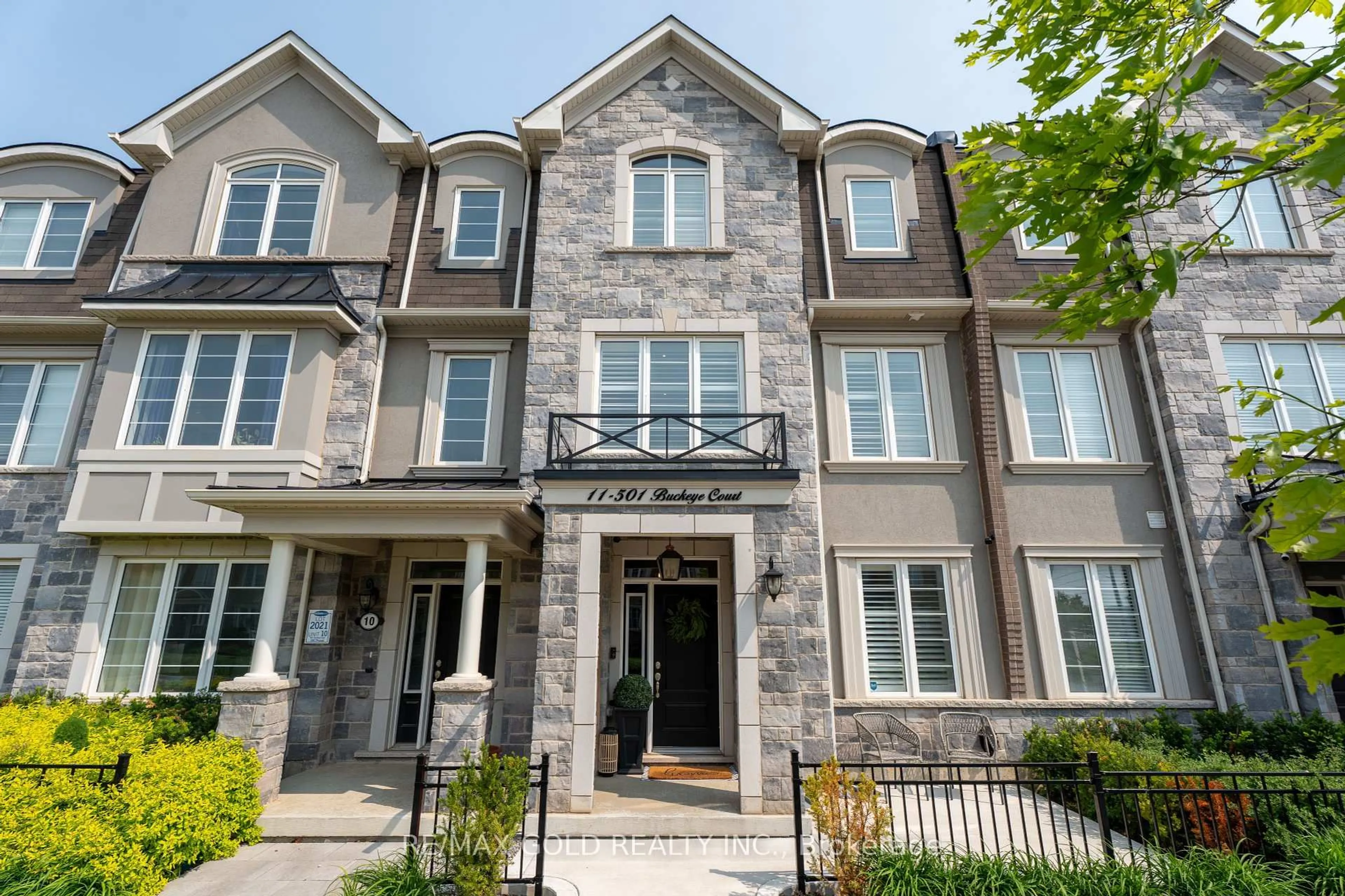 Home with brick exterior material, street for 501 Buckeye Crt #11, Milton Ontario L9E 1P3