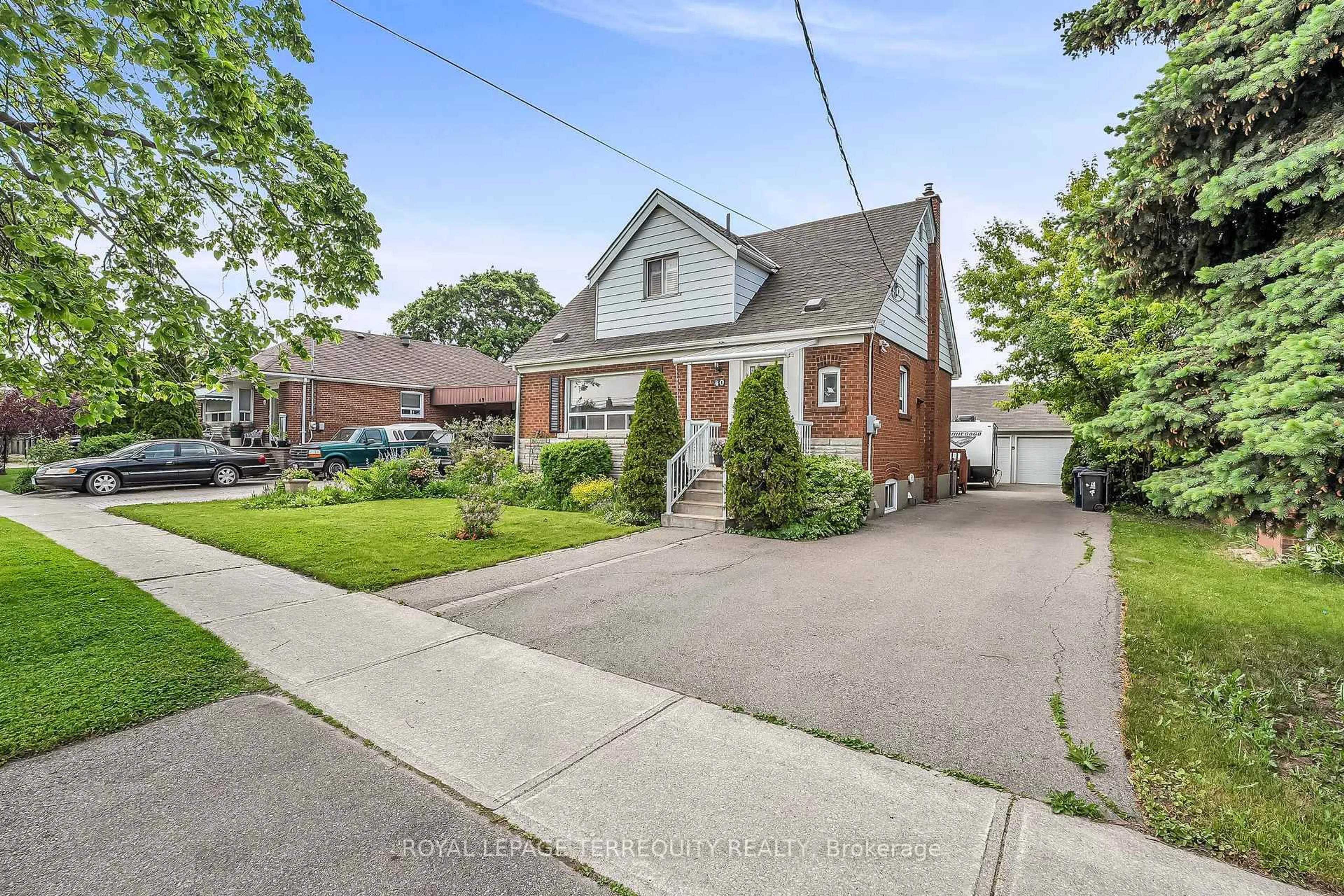 Home with brick exterior material, street for 40 Whitley Ave, Toronto Ontario M3K 1A2