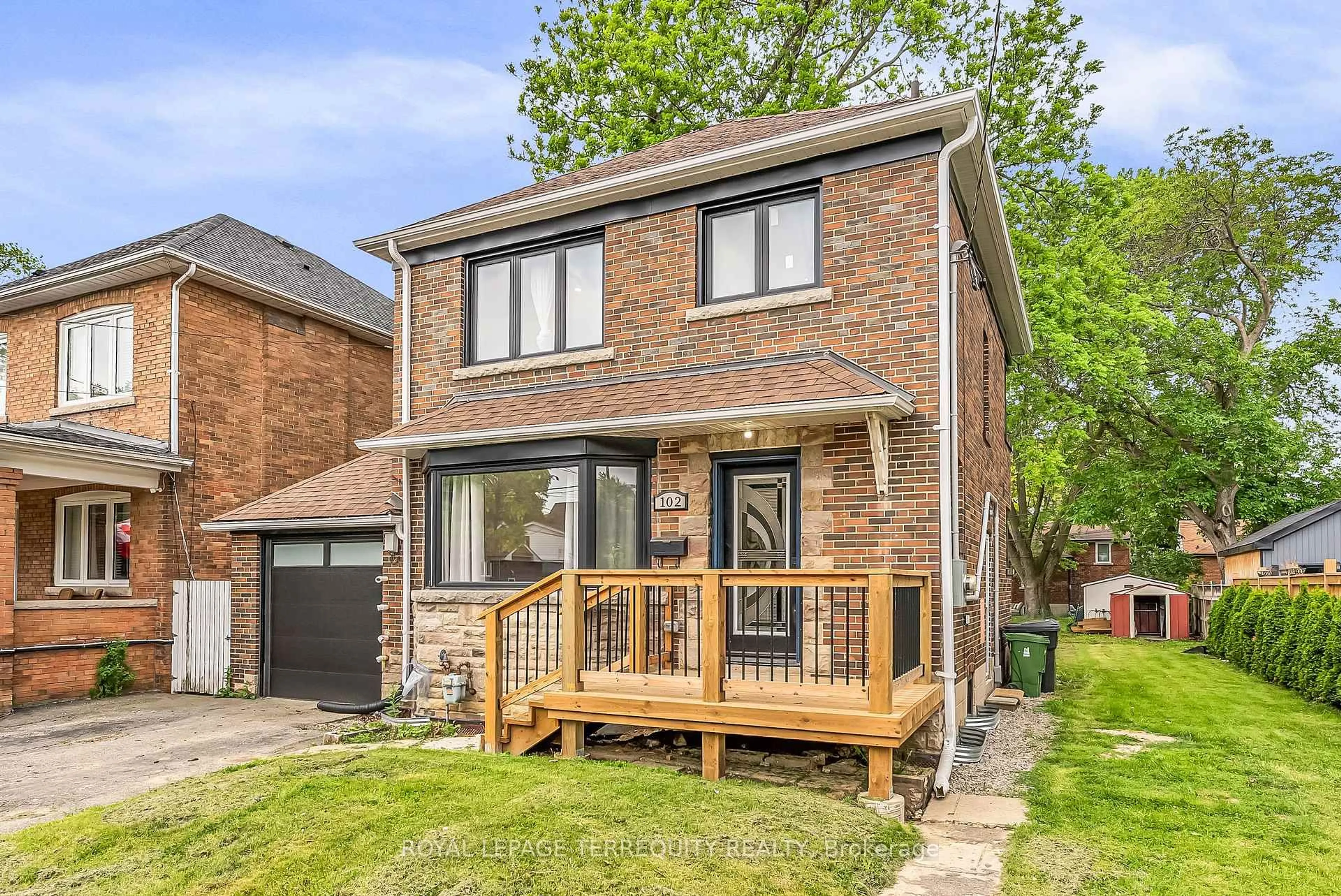 Home with brick exterior material, street for 102 Guestville Ave, Toronto Ontario M6N 4N6