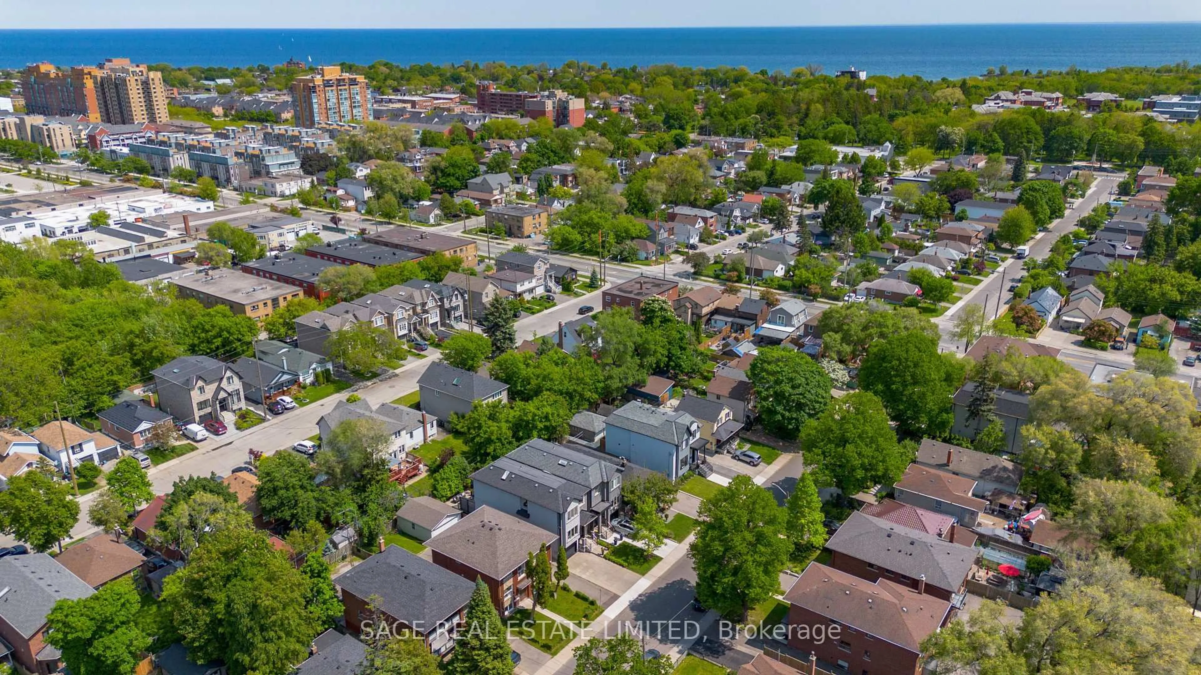 A pic from outside/outdoor area/front of a property/back of a property/a pic from drone, street for 81B Seventeenth St, Toronto Ontario M8V 3K5