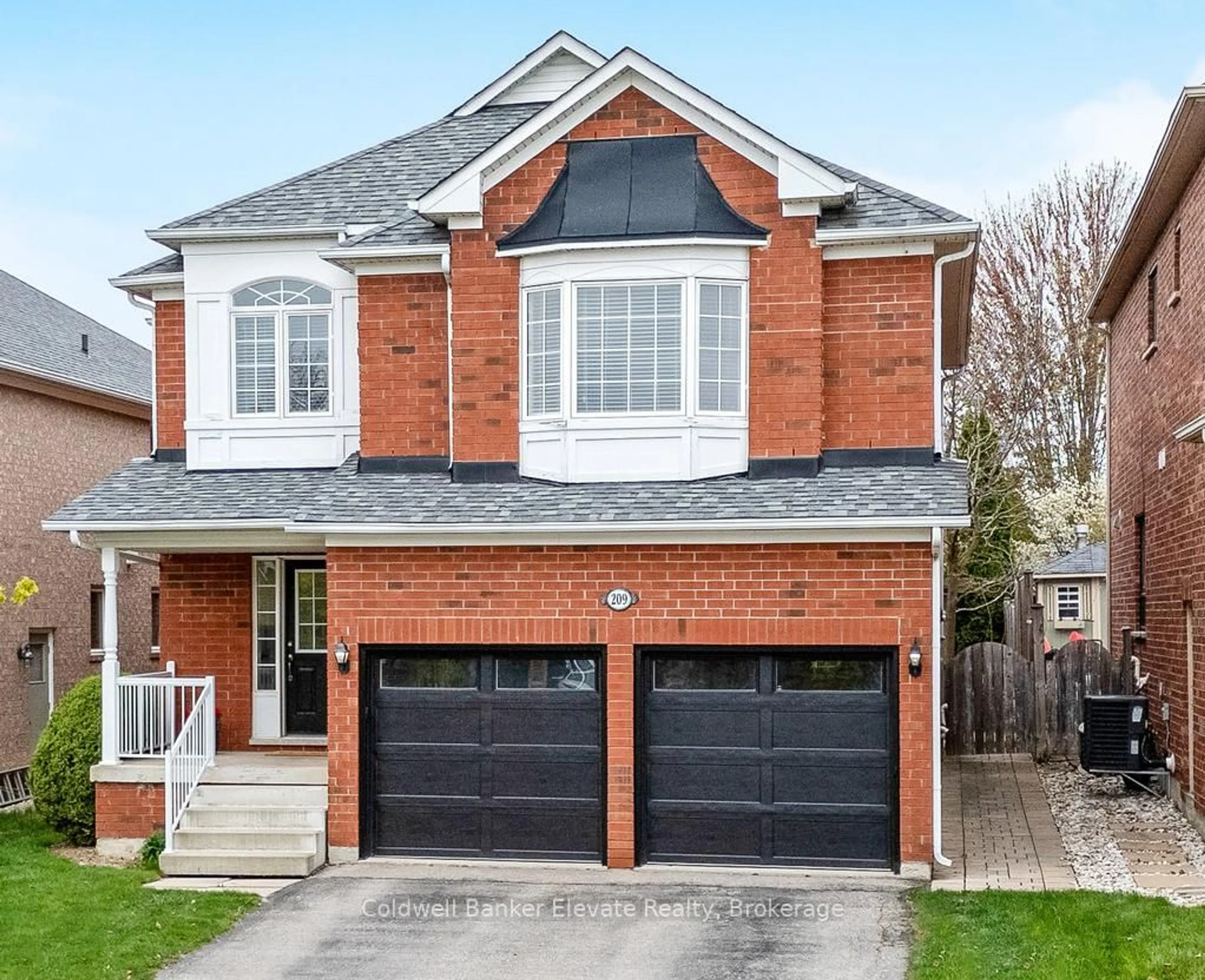 Home with brick exterior material, street for 209 Eaton St, Halton Hills Ontario L7G 5Y2