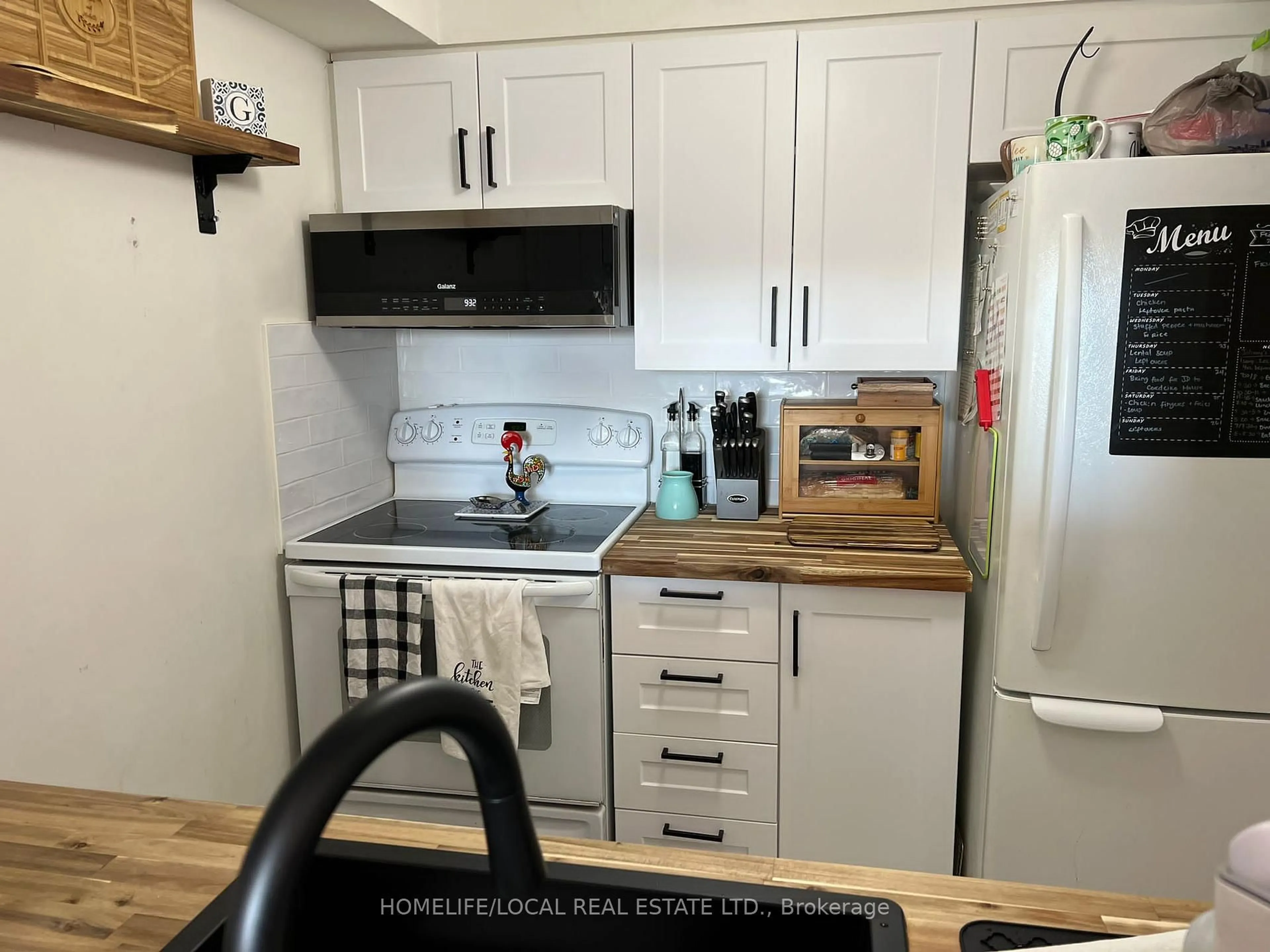 Standard kitchen, wood/laminate floor for 3 Hickory Tree Rd ##1402, Toronto Ontario M9N 3W5