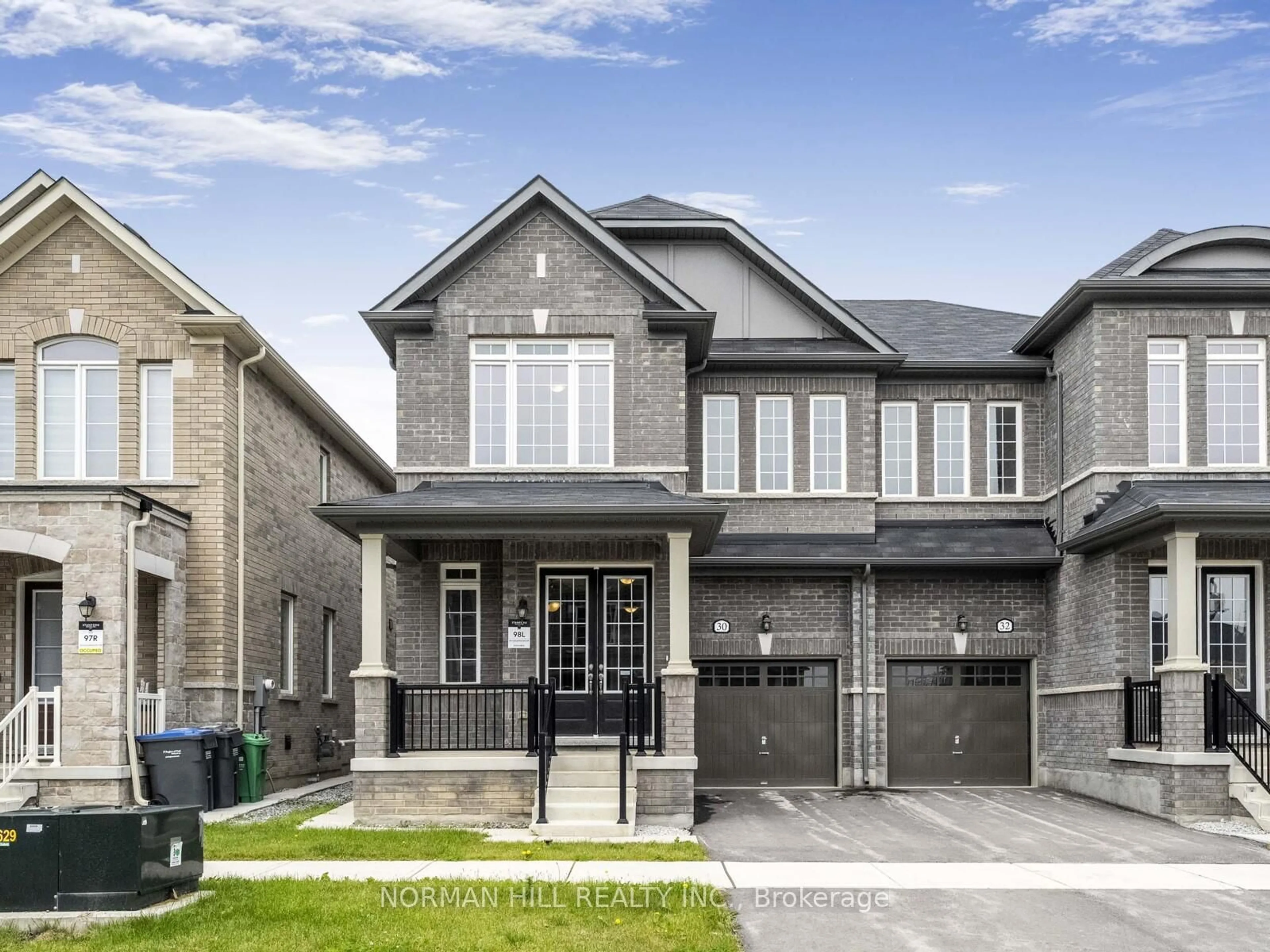 Home with brick exterior material, street for 30 Guildhouse Dr, Brampton Ontario L7A 4W6