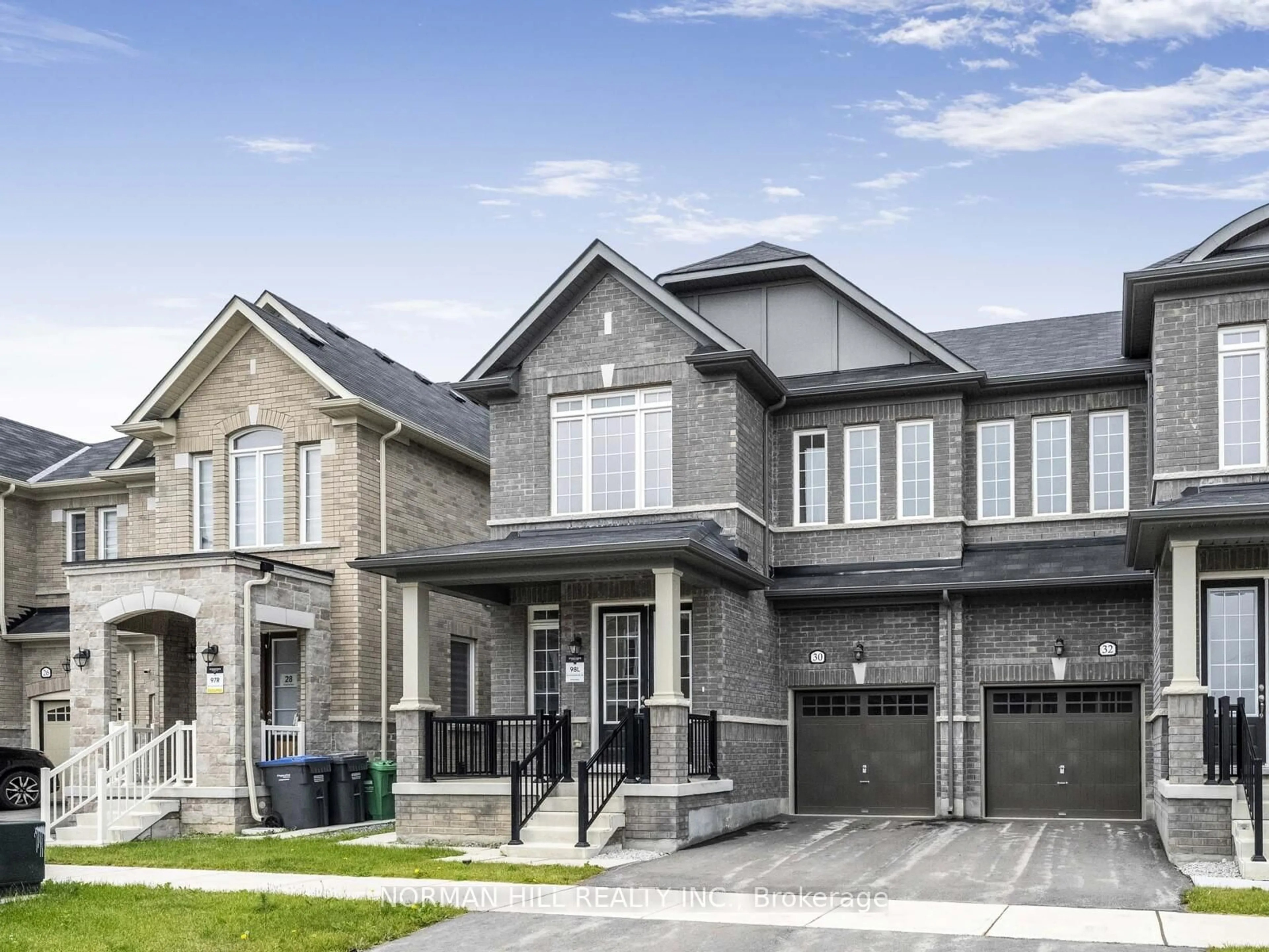 Home with brick exterior material, street for 30 Guildhouse Dr, Brampton Ontario L7A 4W6