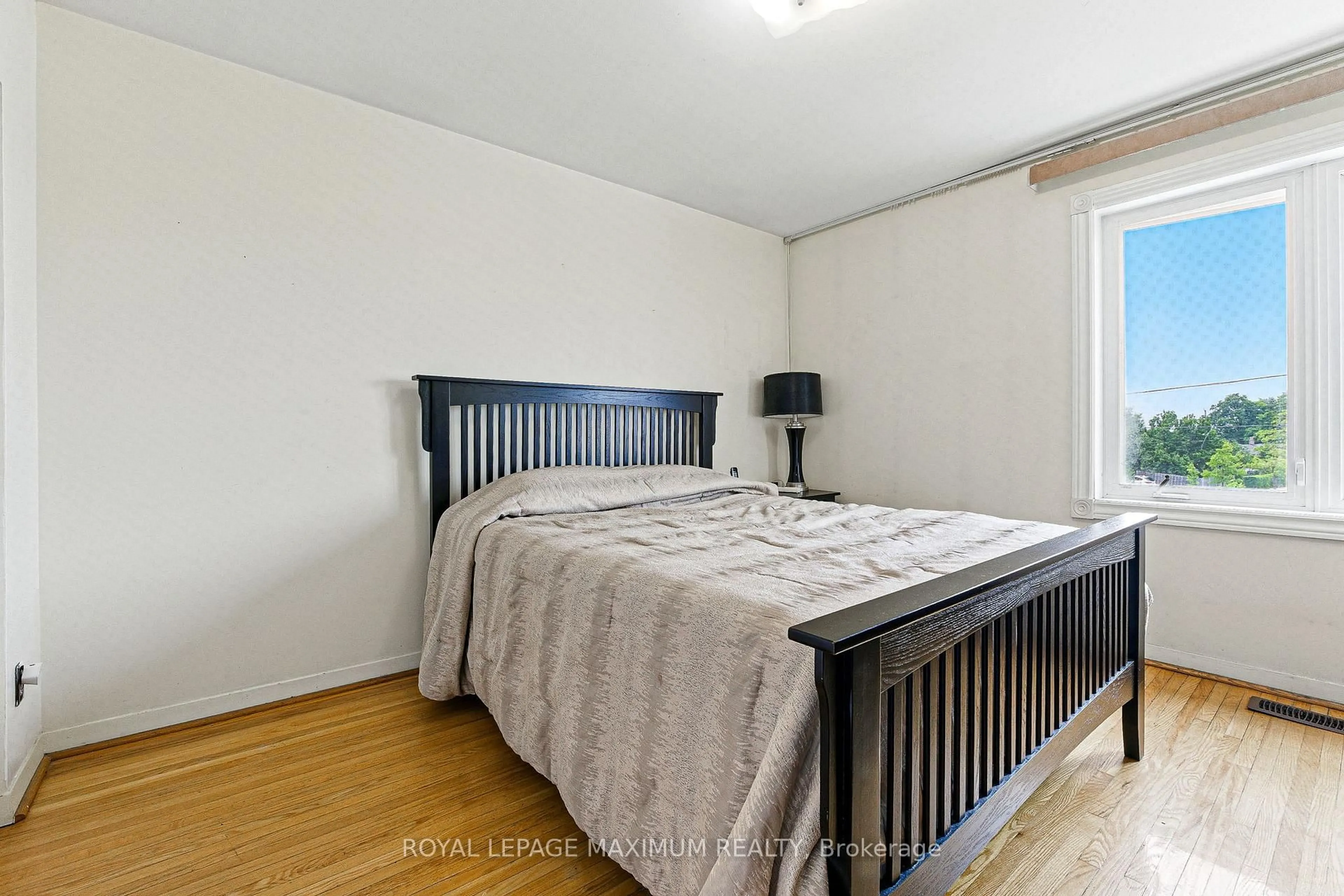 Bedroom with bed, wood/laminate floor for 32 Fennimore Cres, Toronto Ontario M3N 1G8