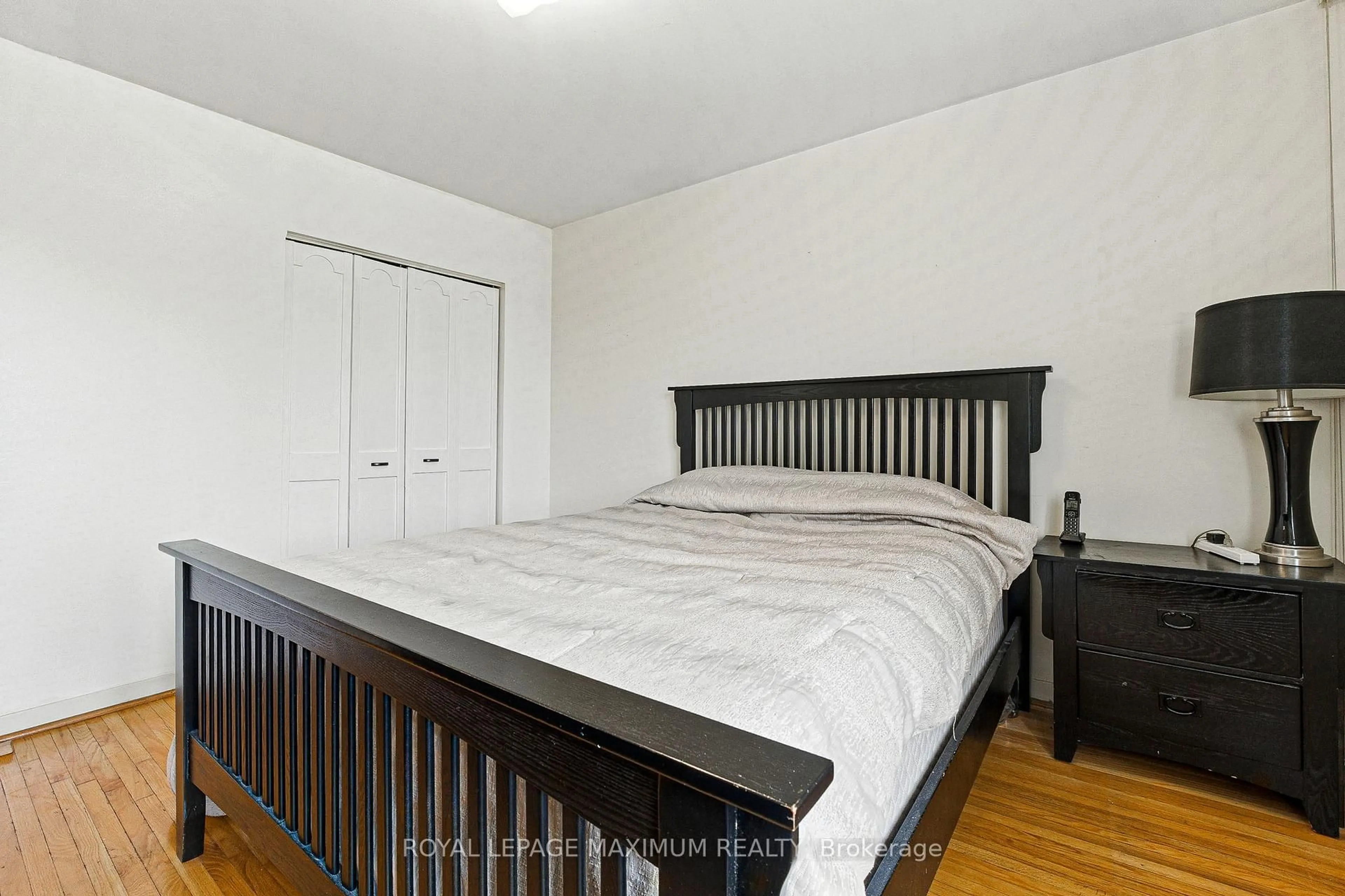 Bedroom with bed, wood/laminate floor for 32 Fennimore Cres, Toronto Ontario M3N 1G8